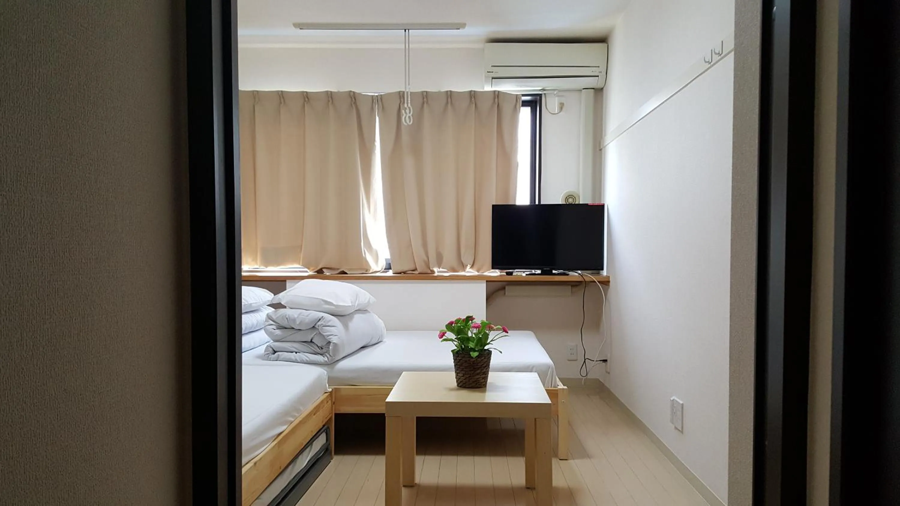 Bed in Sophiearth Apartment