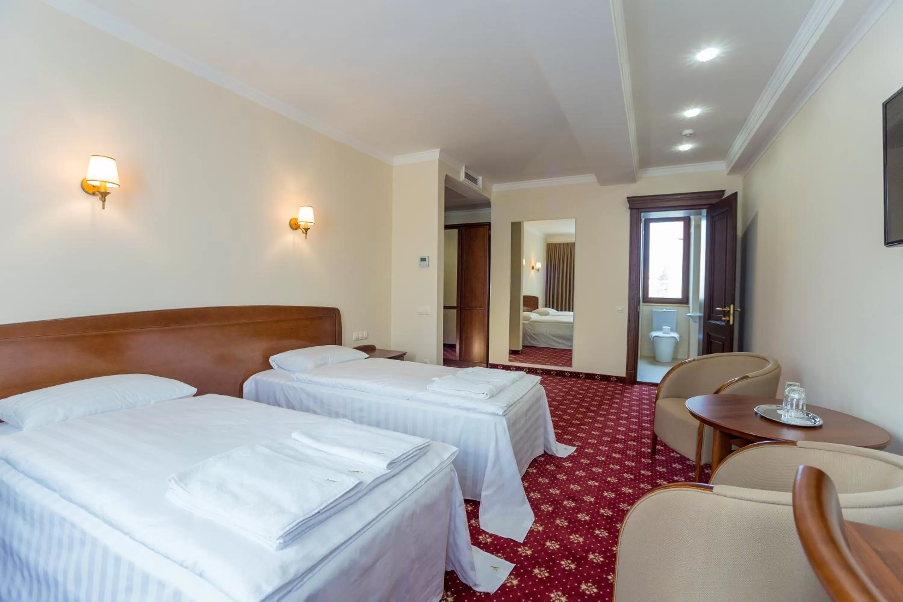 Photo of the whole room, Bed in Ambassador Hotel