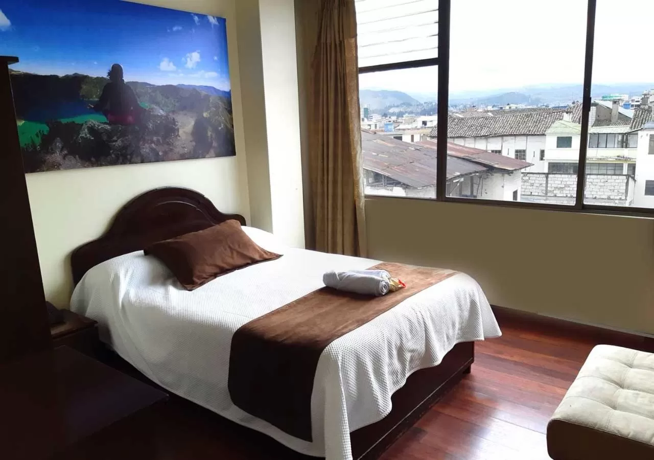 Photo of the whole room, Bed in La Merced Plaza Hostal