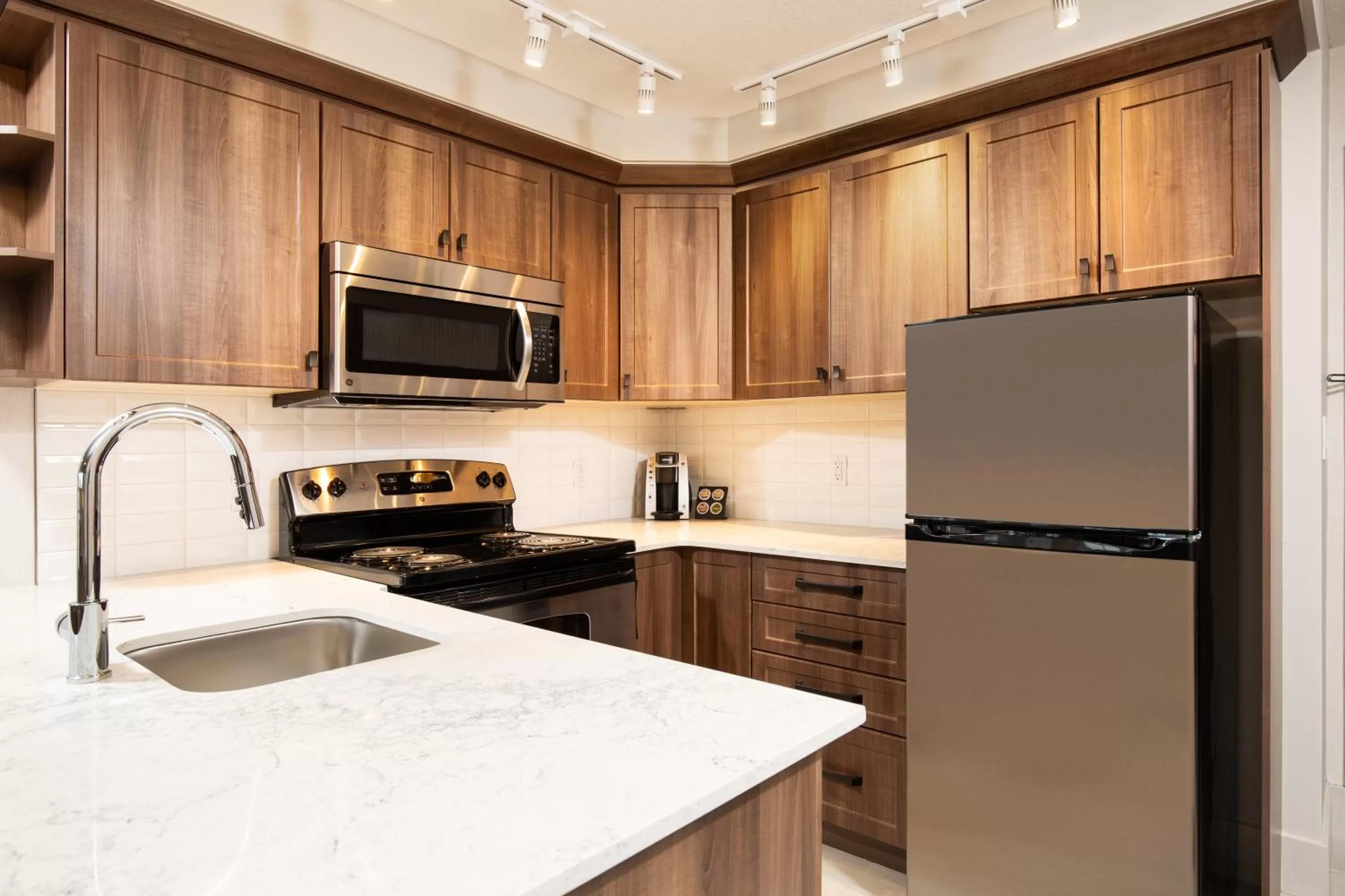 Kitchen or kitchenette in Pomeroy Hotel Fort McMurray