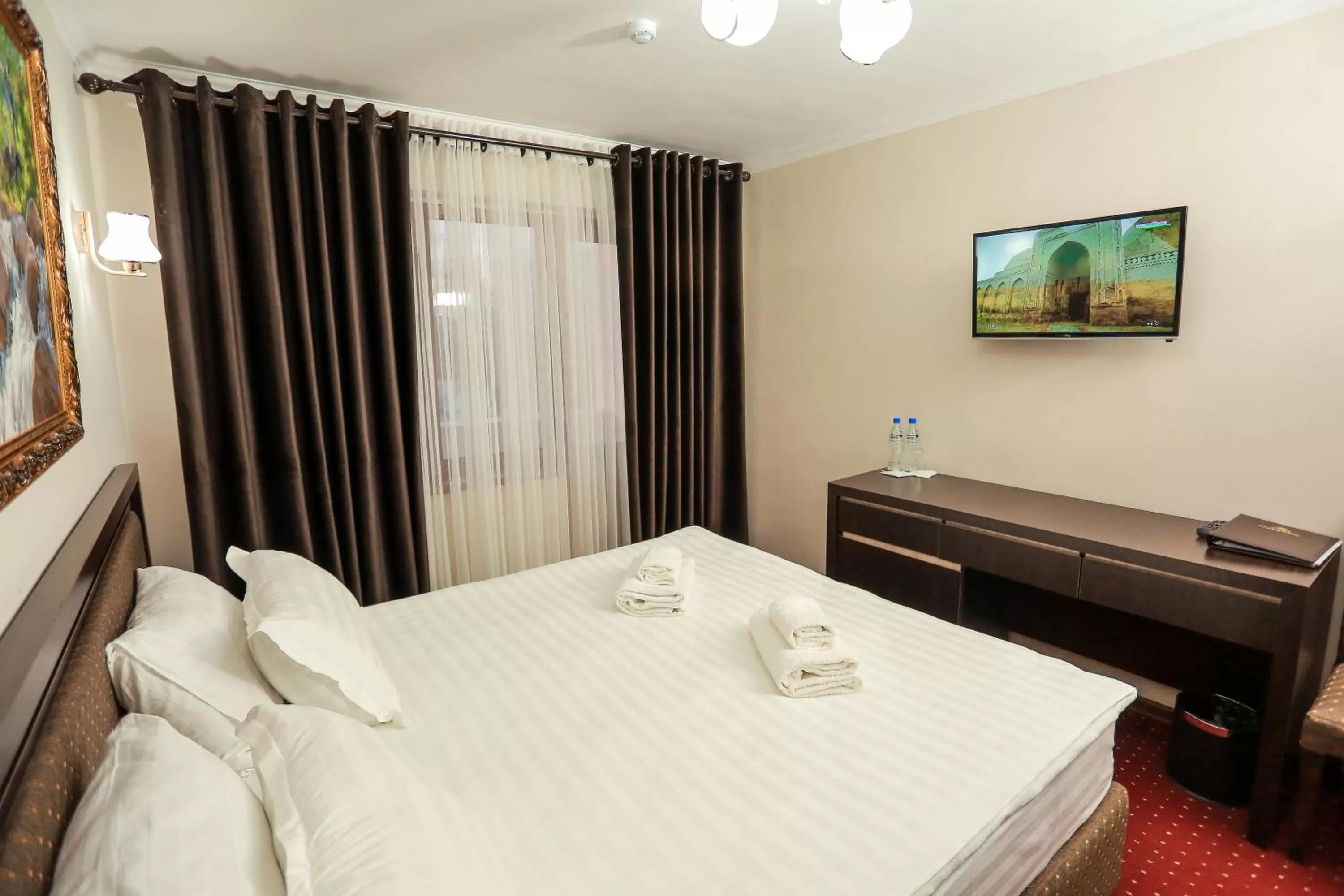 Bed in Sugdiyon Hotel