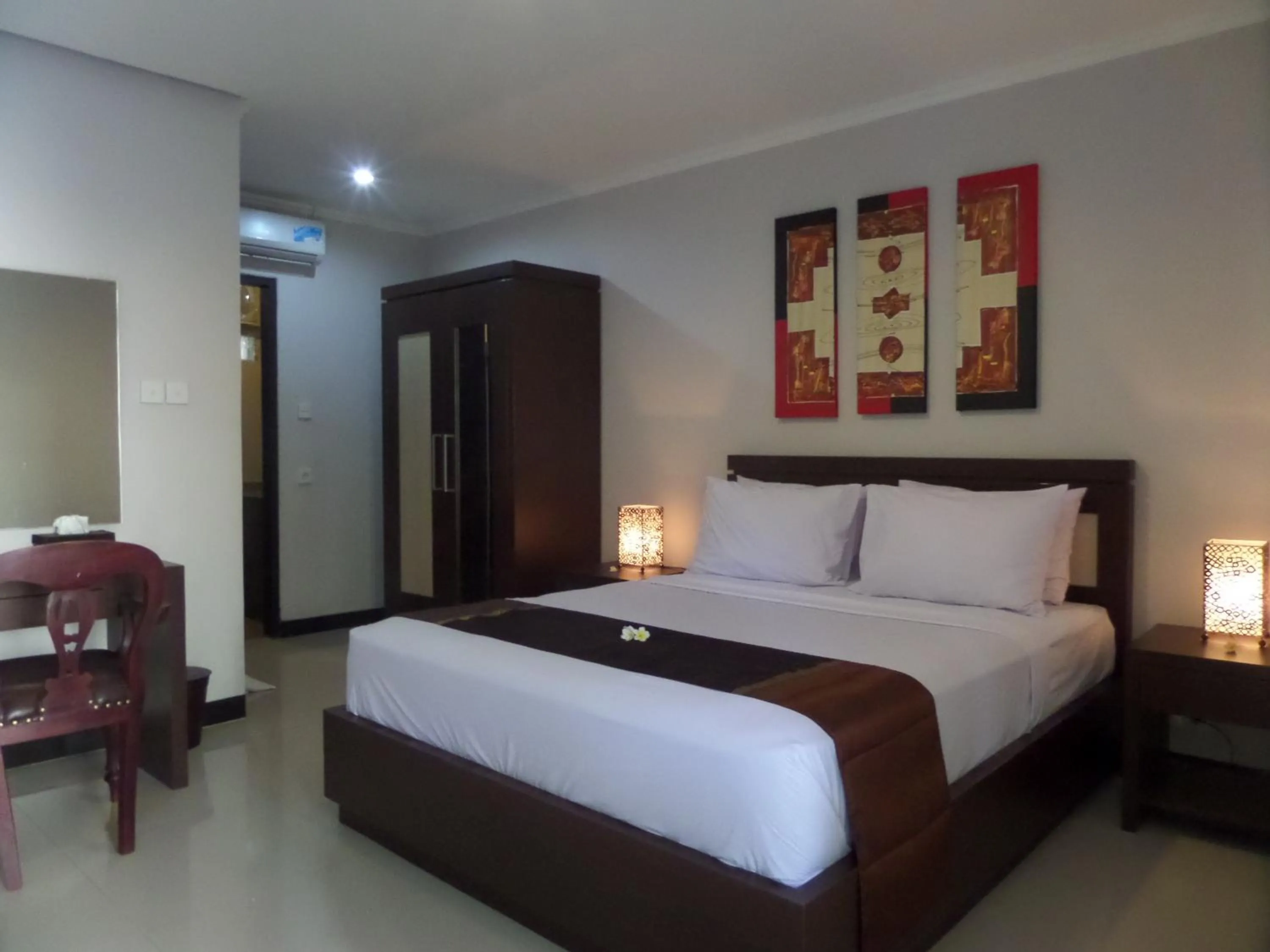Bed in Mansu Hotel and Spa Legian