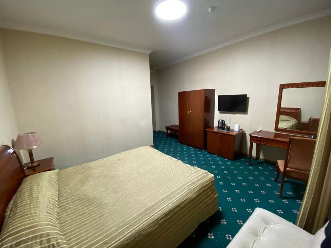 Bed in Deluxe SPA-Hotel