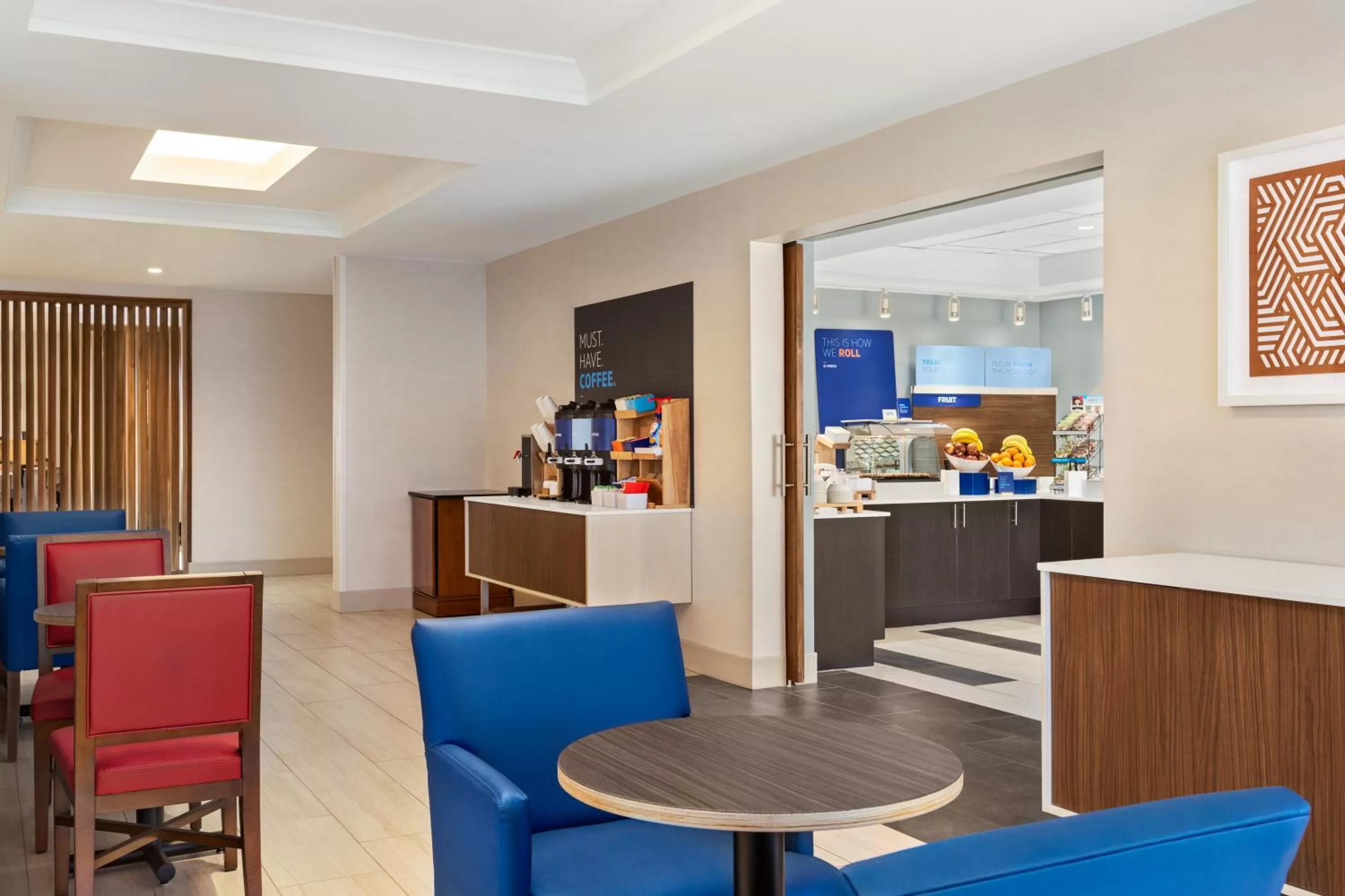 Seating area in Holiday Inn Express & Suites Denver Airport by IHG
