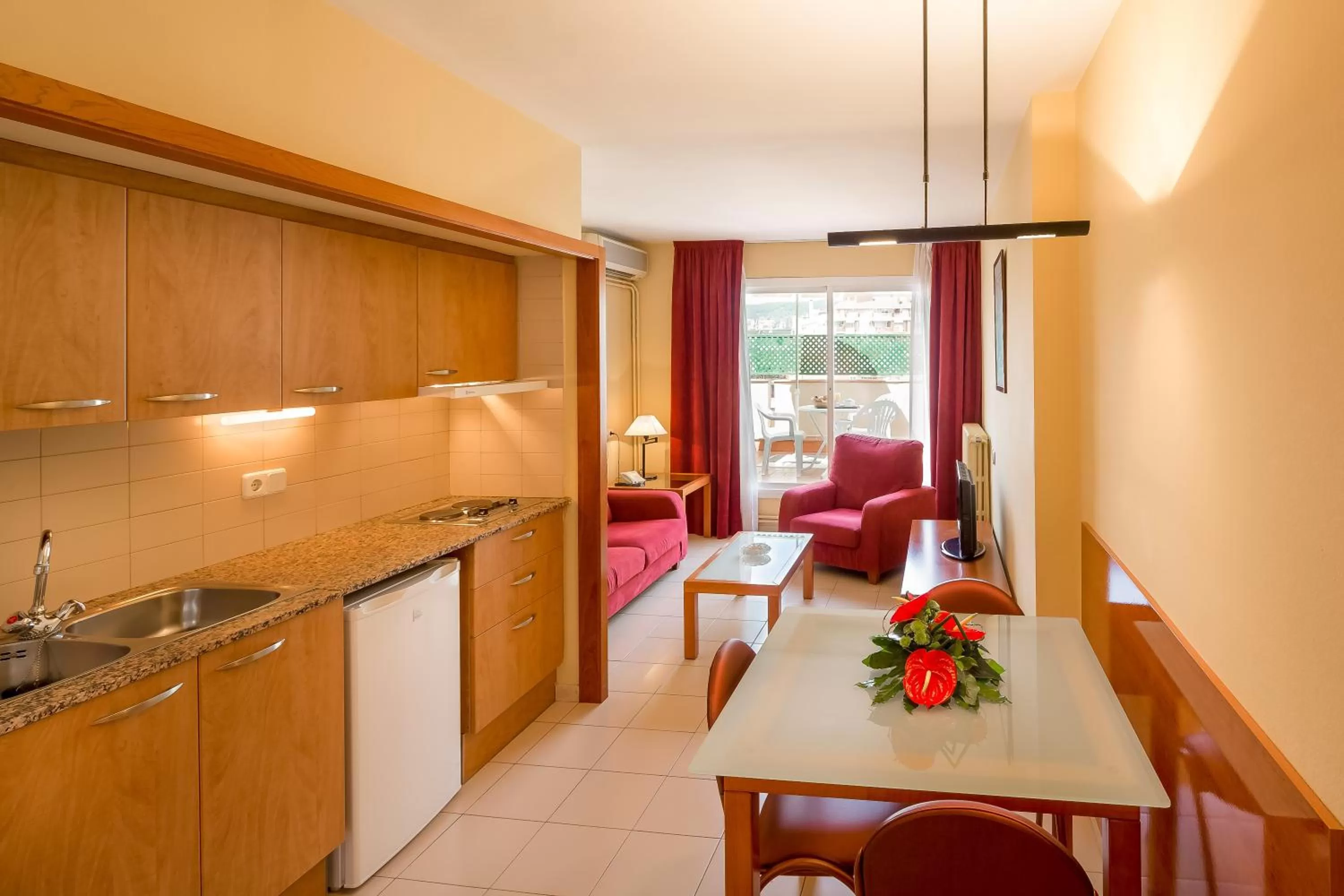 Seating area in Aparthotel Bertrán