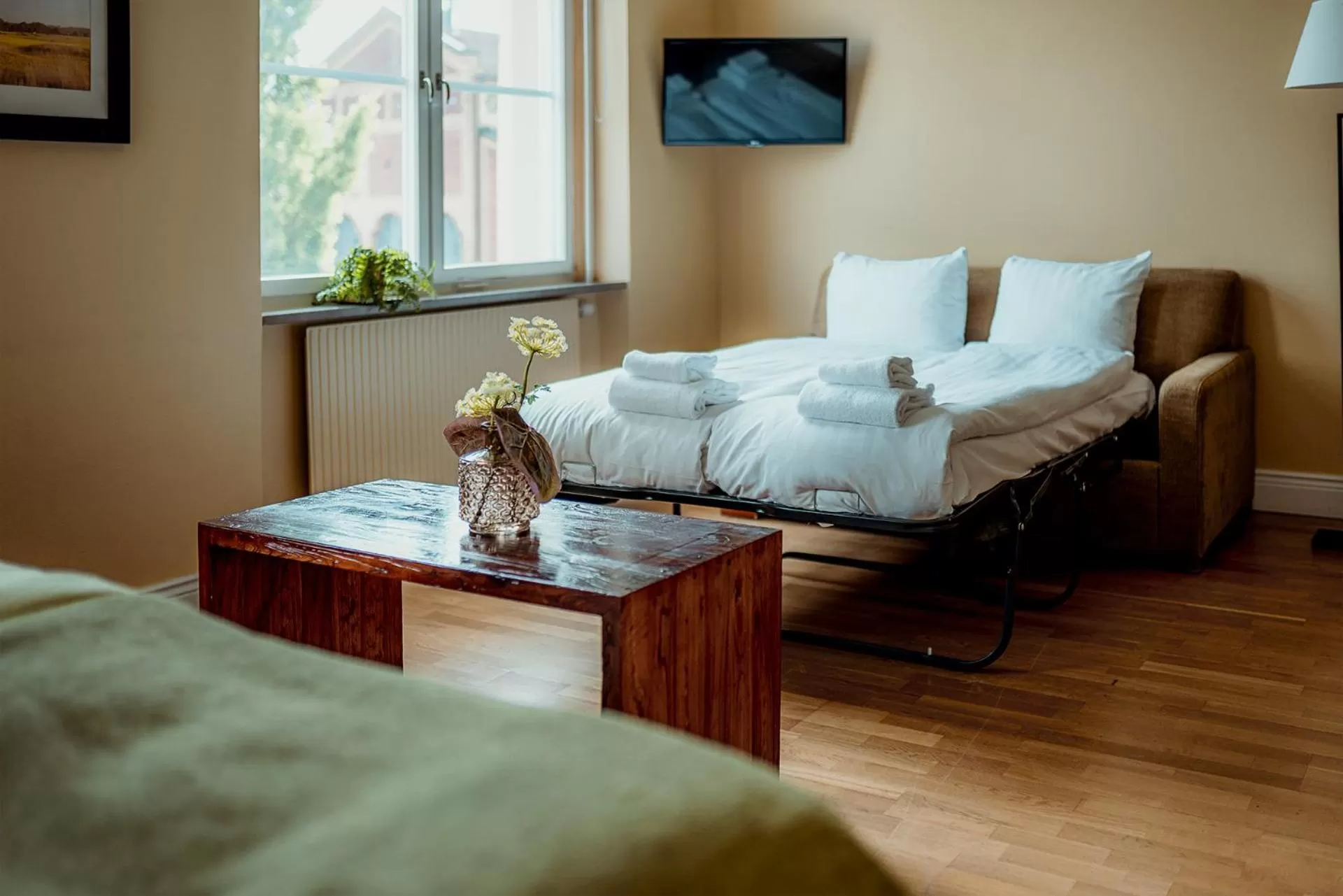 Bed in Sunlight Hotel Conference & Spa