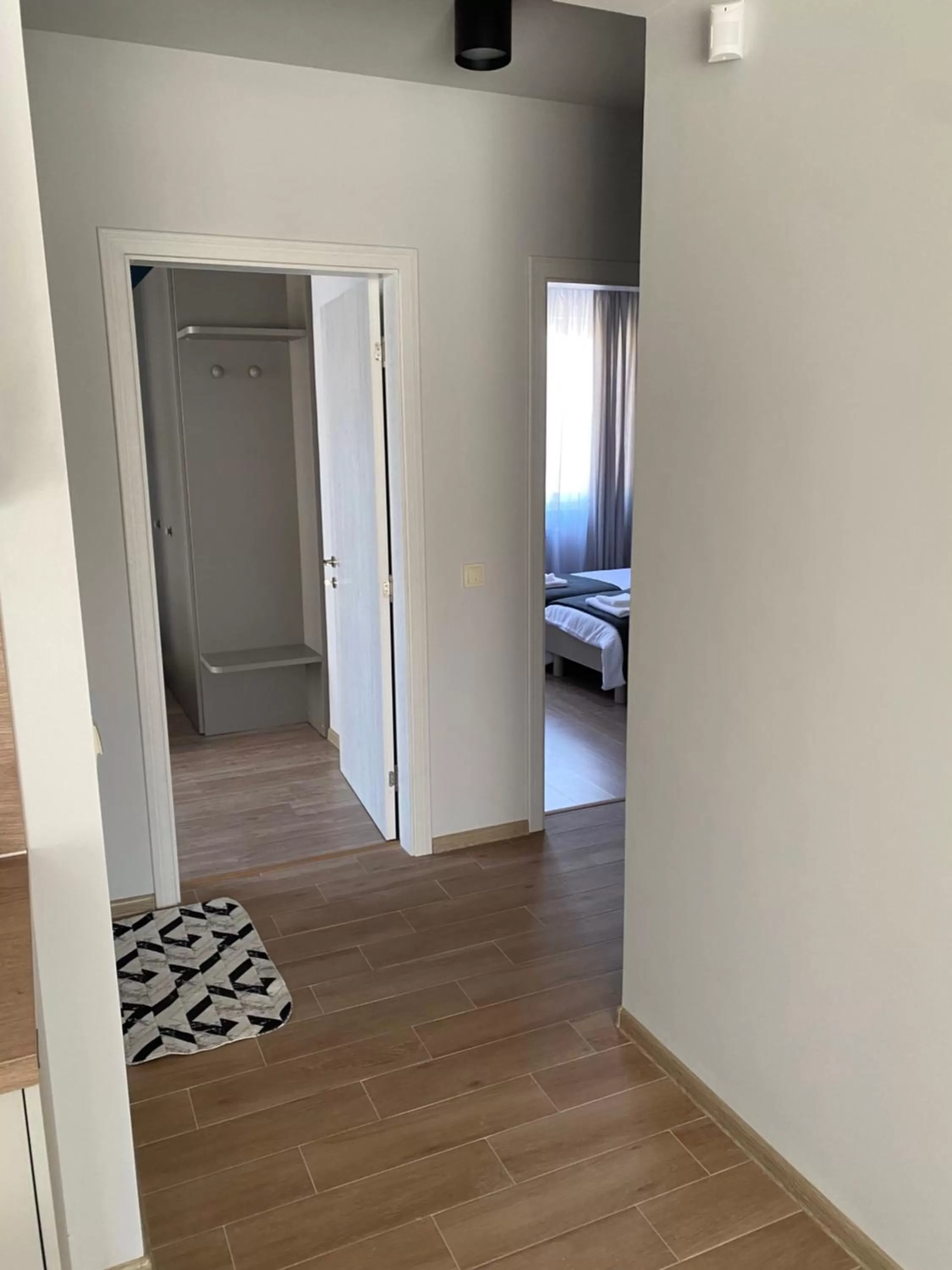 Bed, TV/Entertainment Center in 7th Sense boutique apartments