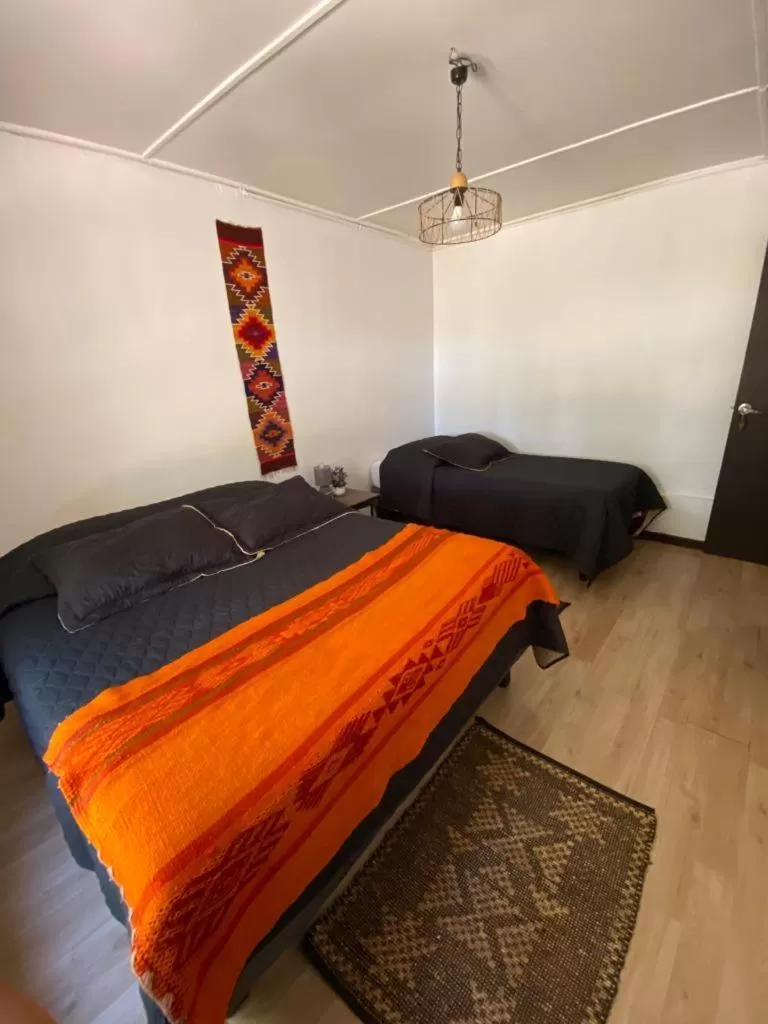 Bed in CaminAndes Hostal