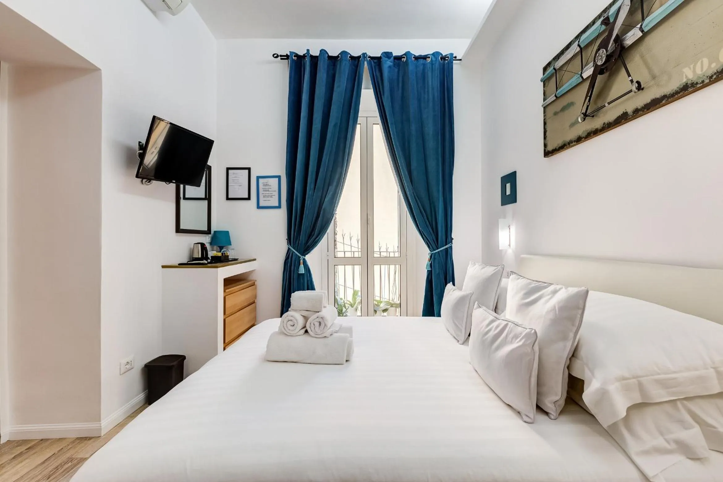 Bed in Ripetta Central Suites