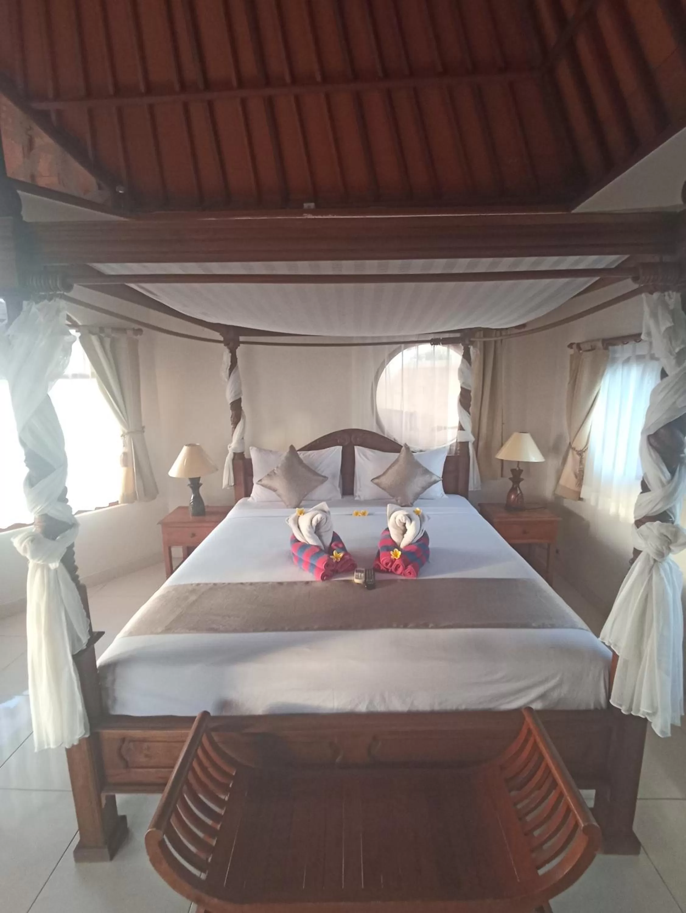 Bed in Kusnadi Hotel