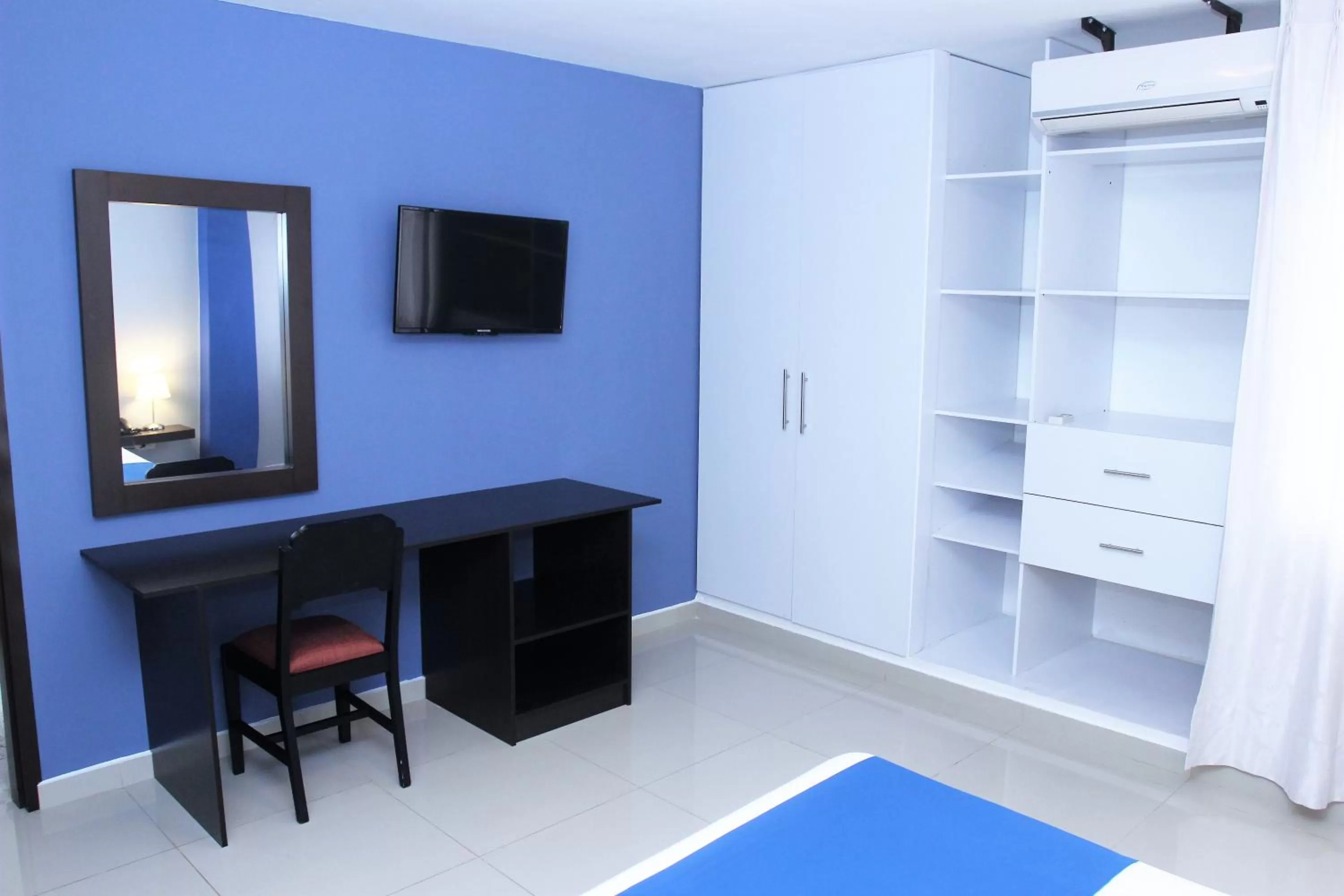 Photo of the whole room, TV/Entertainment Center in Eslait Hotel & Apartamentos