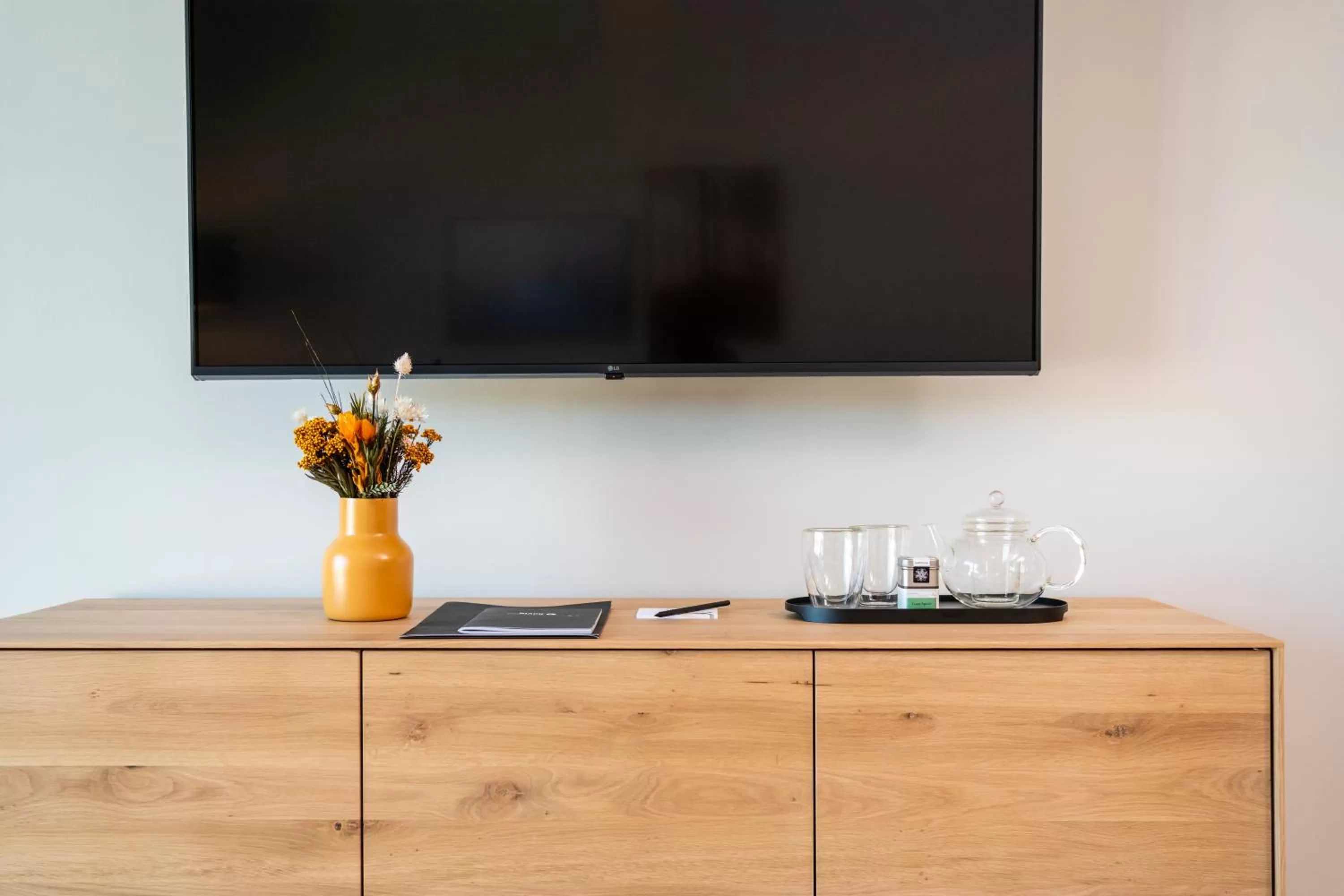 TV and multimedia, TV/Entertainment Center in Black F Tower - Serviced Apartments