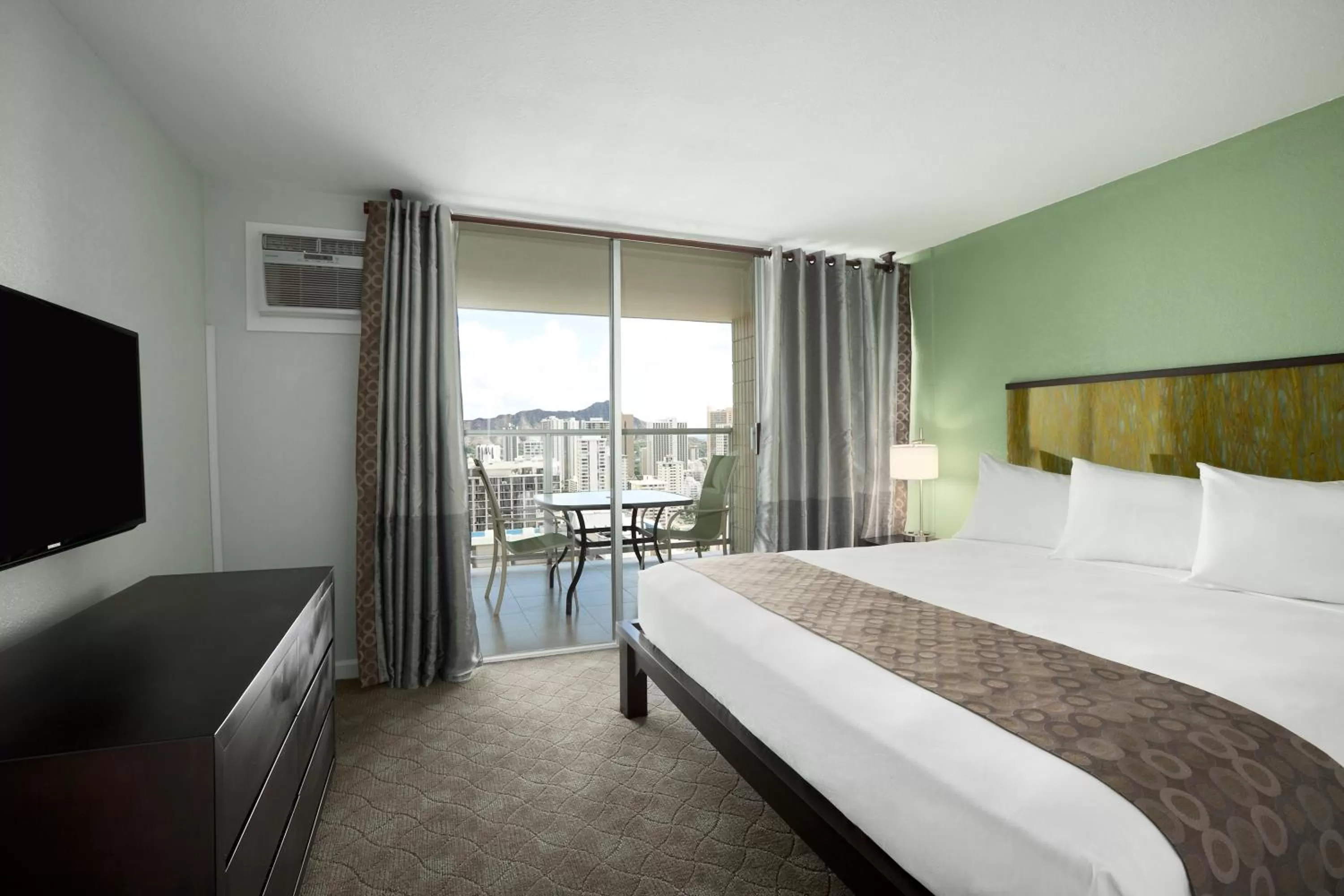 Bed in Skyline Island Colony Hotel