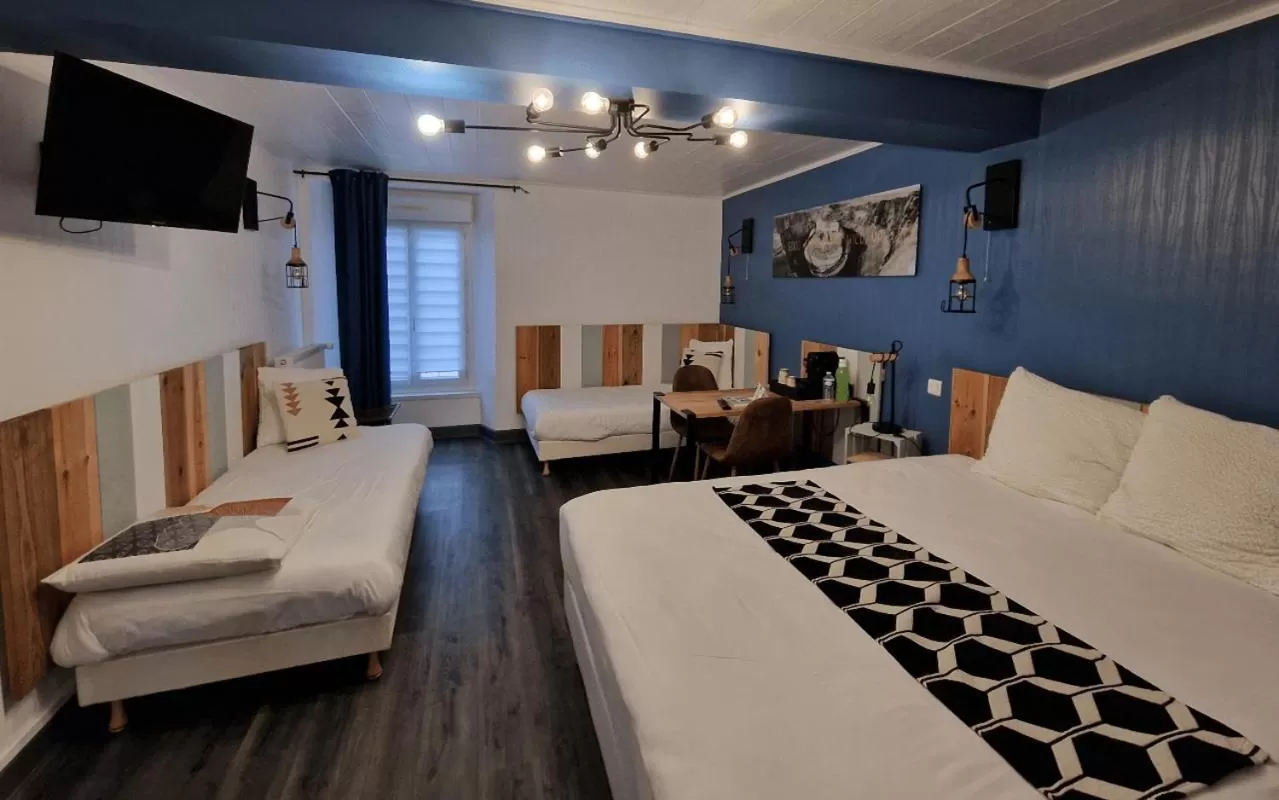 Bedroom, Bed in Logis Central Hôtel - Restaurant & Spa