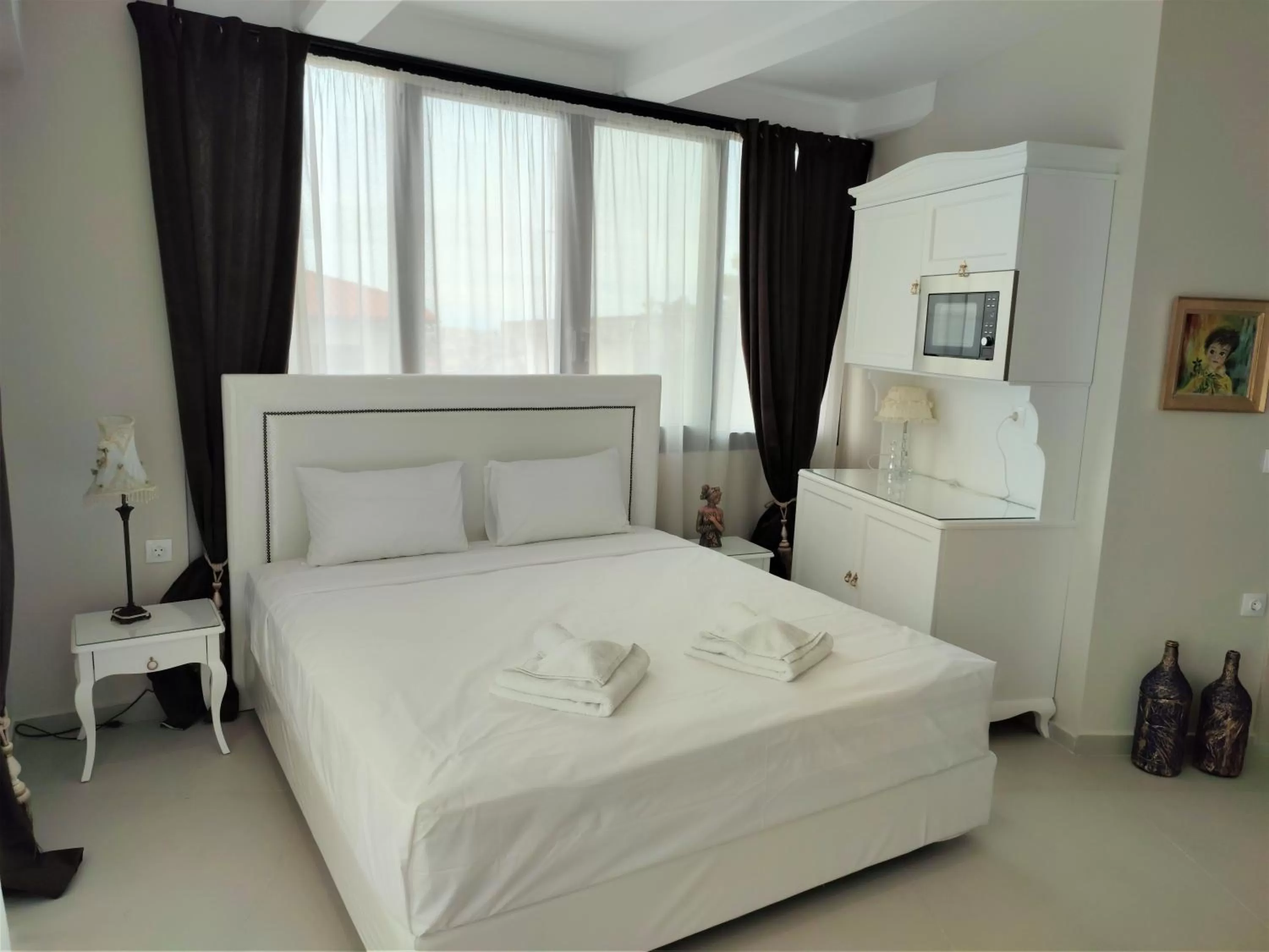 Bed in Light Blue Hotel