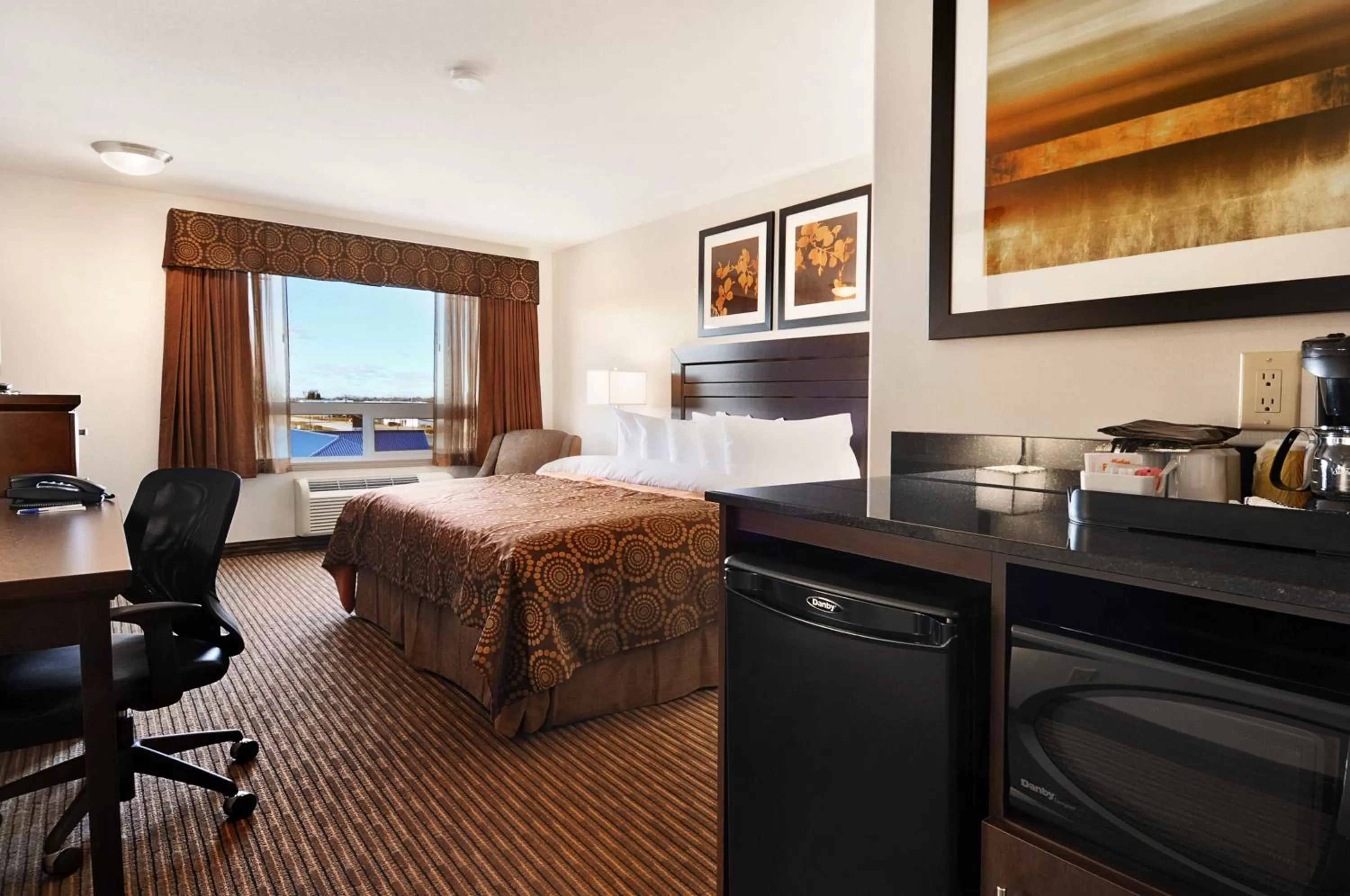 Photo of the whole room, Bed in Canalta Hotel Tisdale