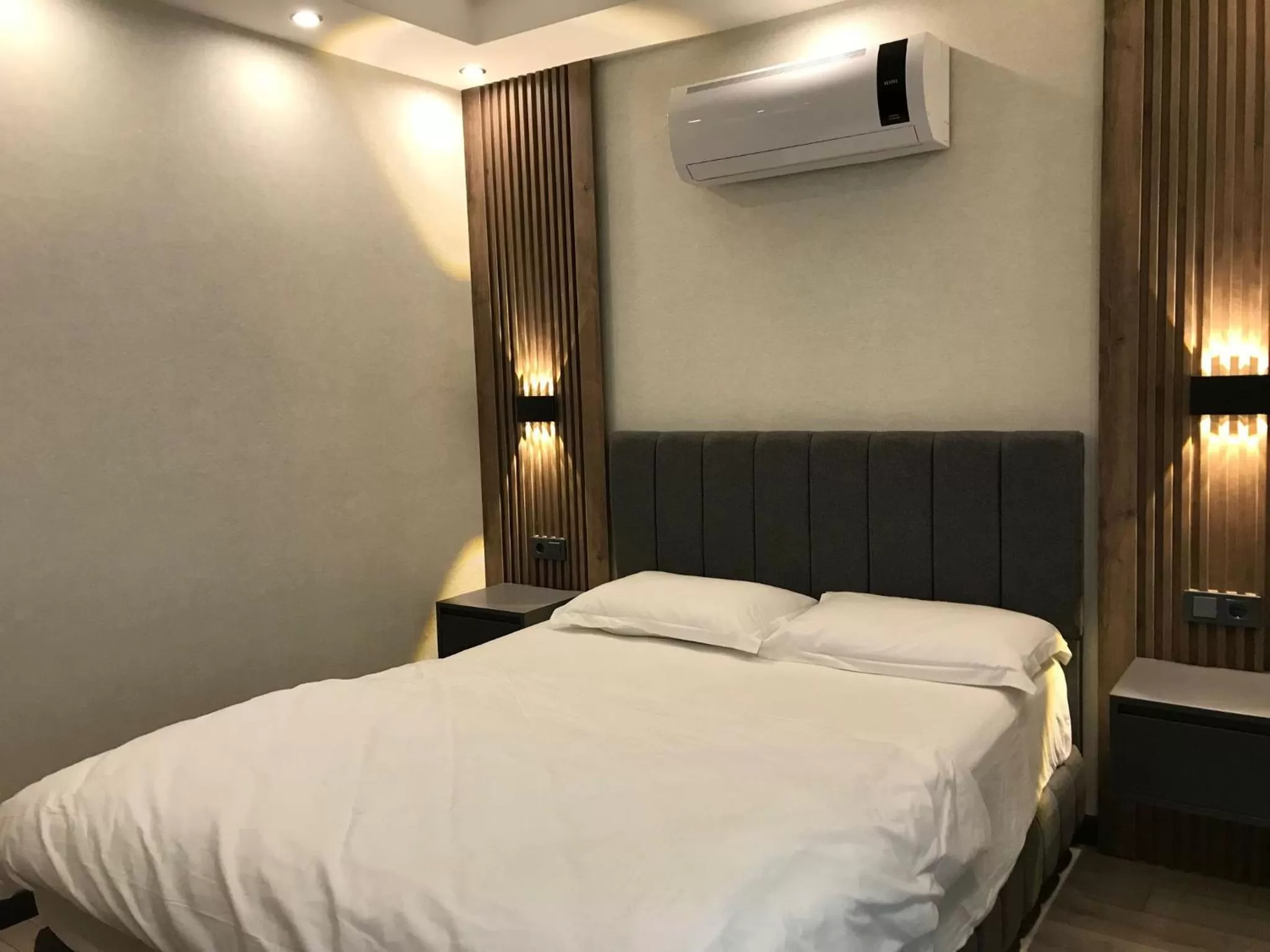 Bed in Yılmaz Suit Apartments