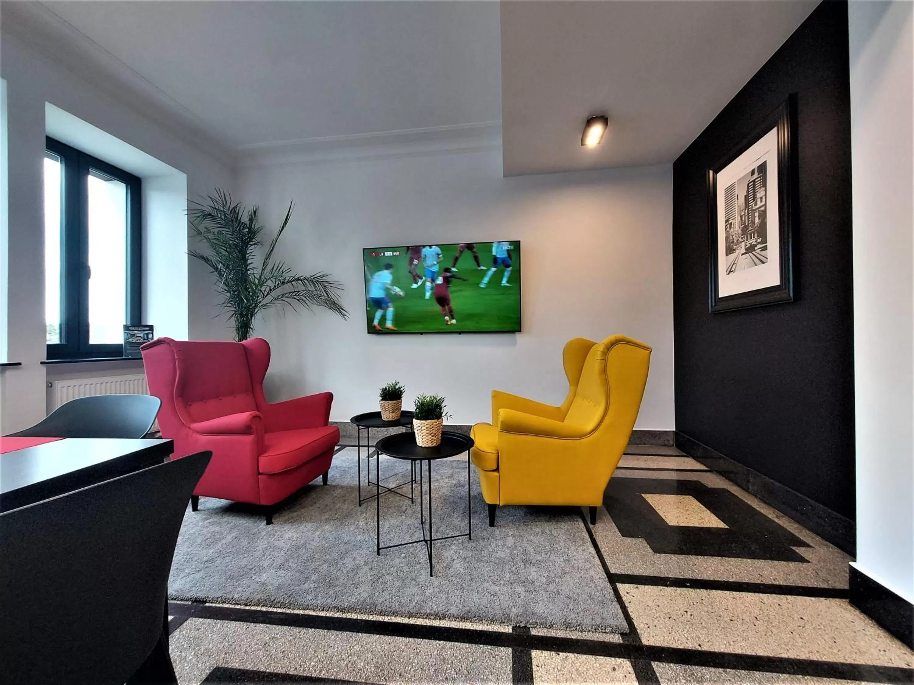 Communal lounge/ TV room in VANTA Business Center