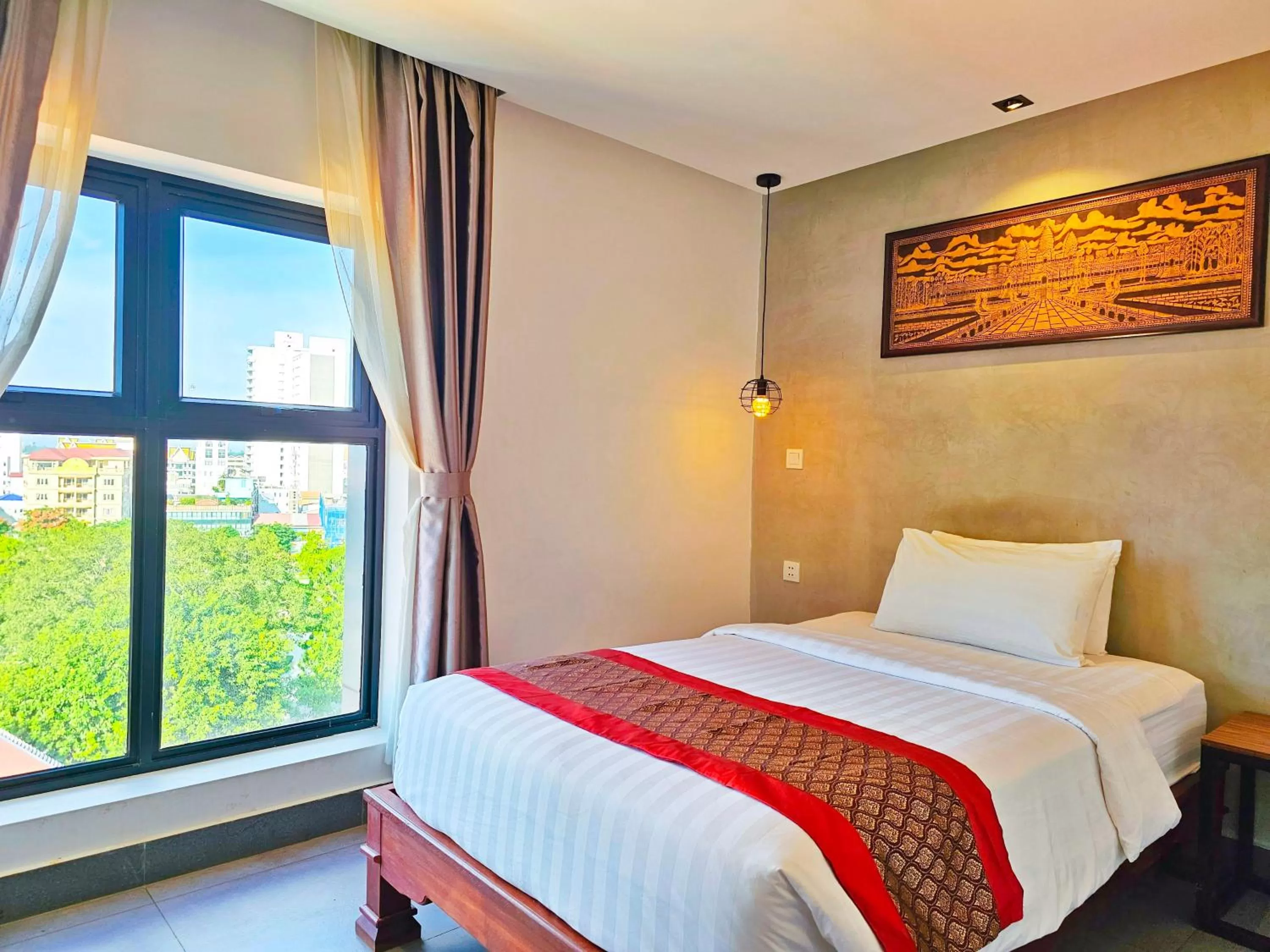 Bed in Le Botum Hotel