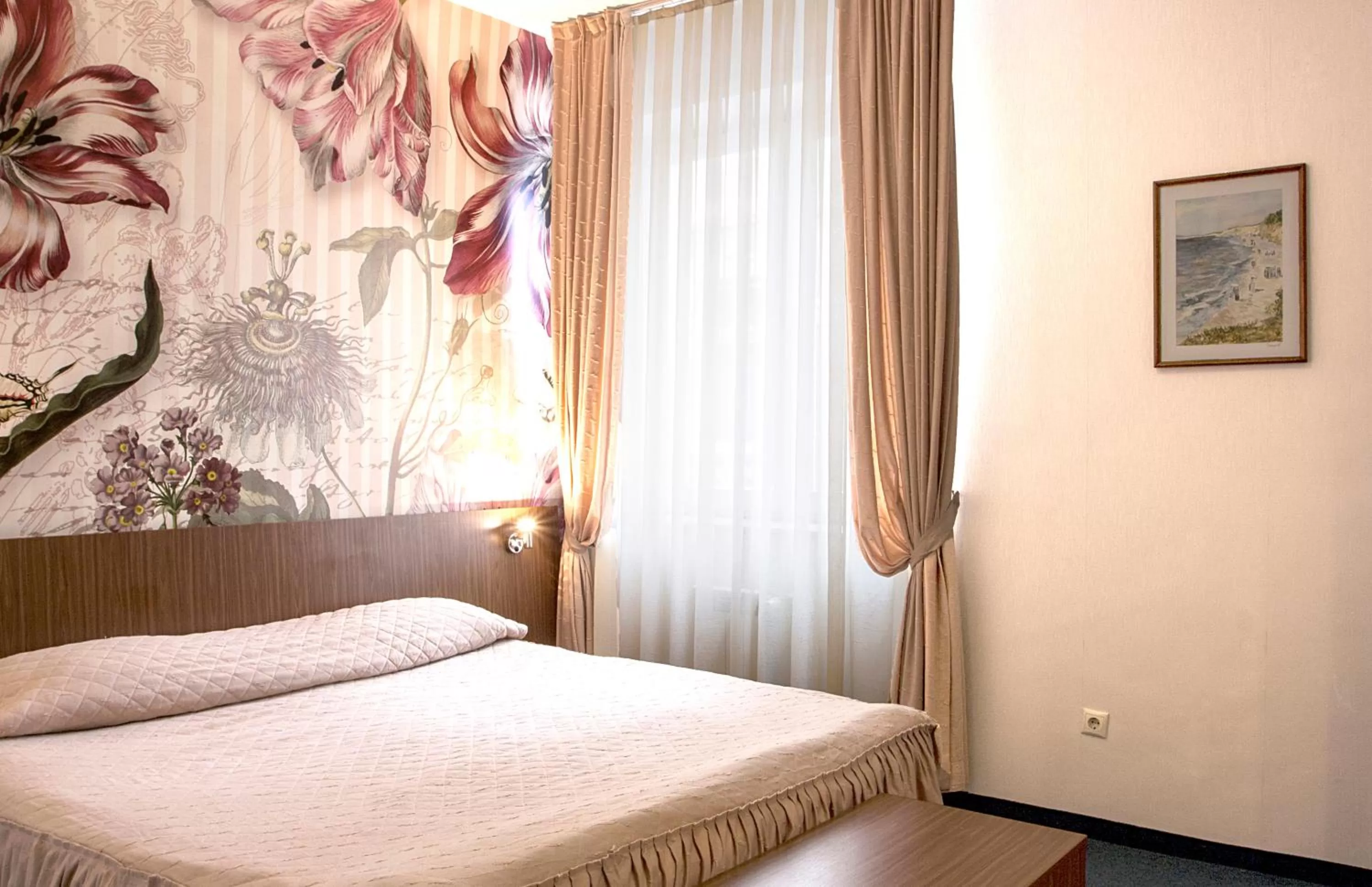 Bed in DITER Family Hotel