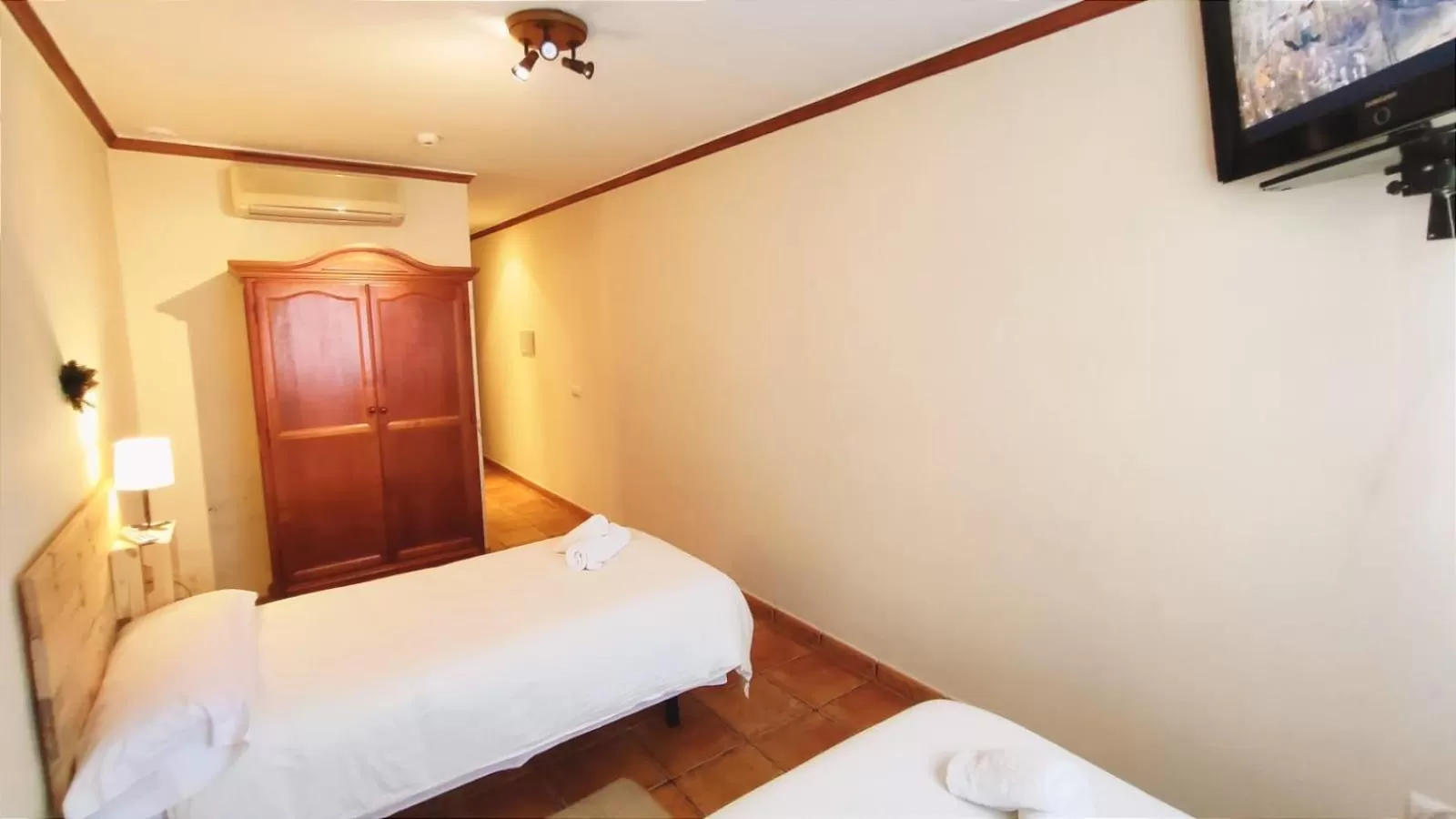 Bed in El Bosque Suites&Room