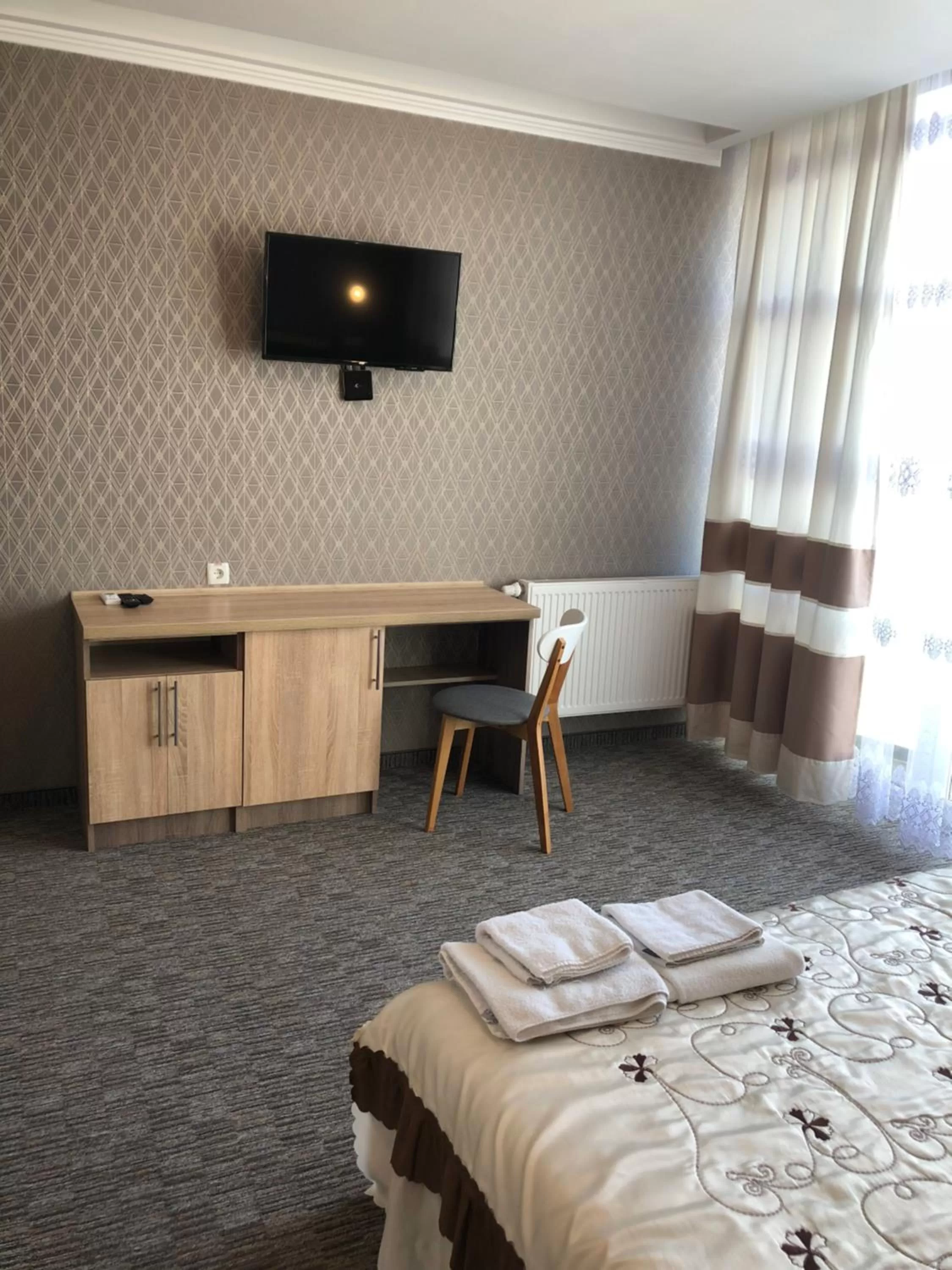 TV/Entertainment Center in Motel Kurortnyy & SPA