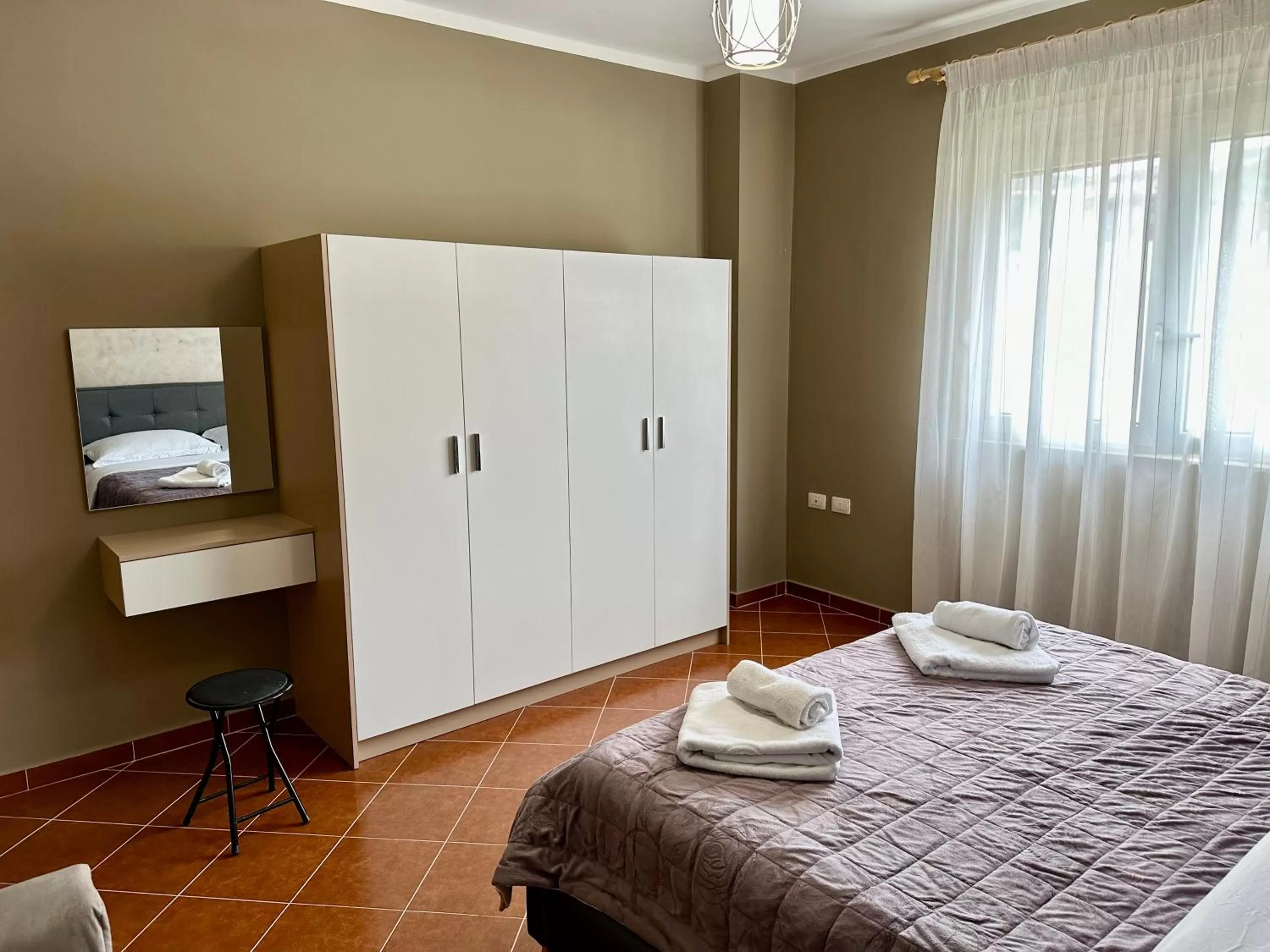 Bed in FAMILY SUITE RESIDENCE