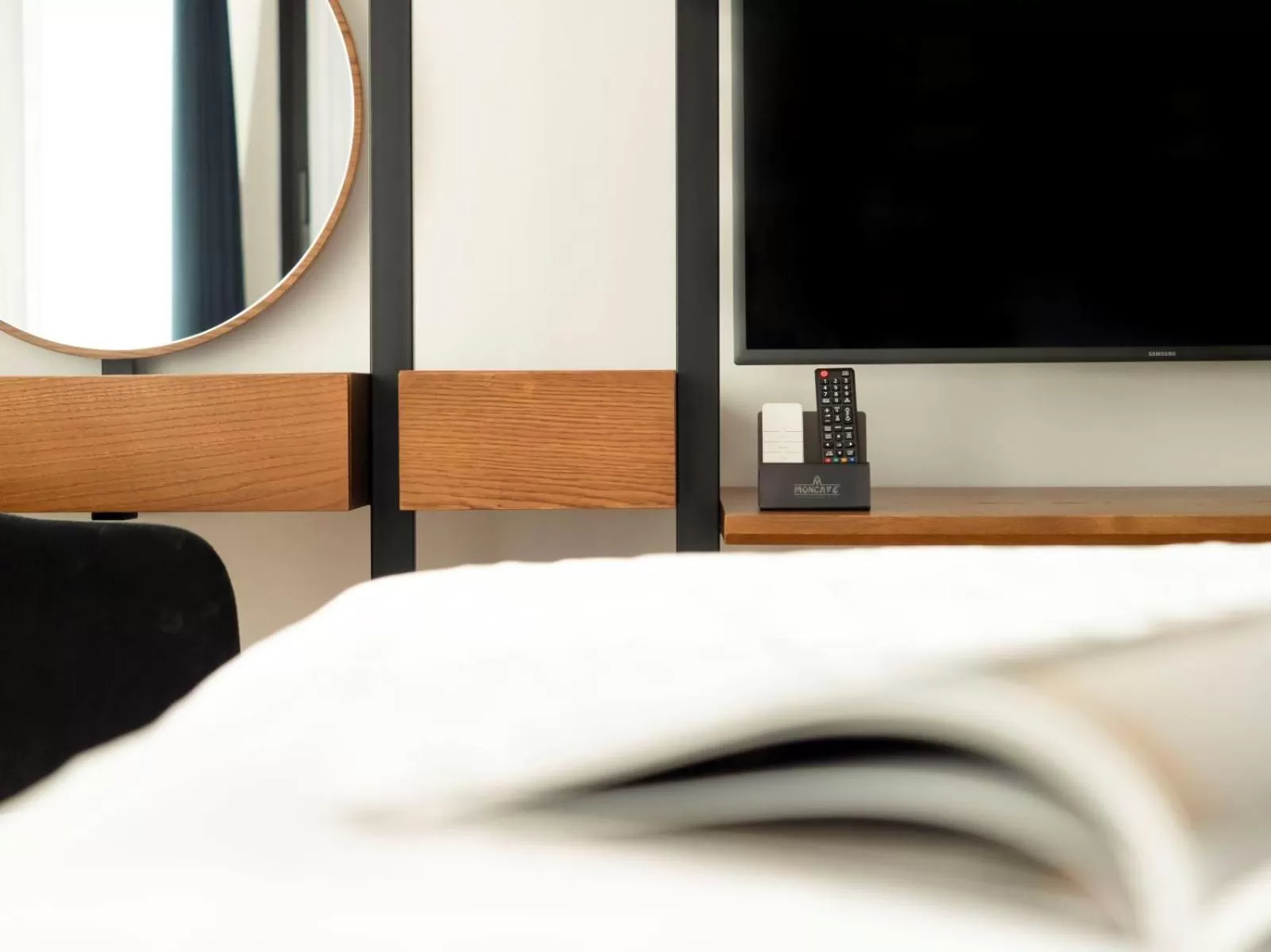 Bed, TV/Entertainment Center in Moncafe BoutiqueHotel Spa