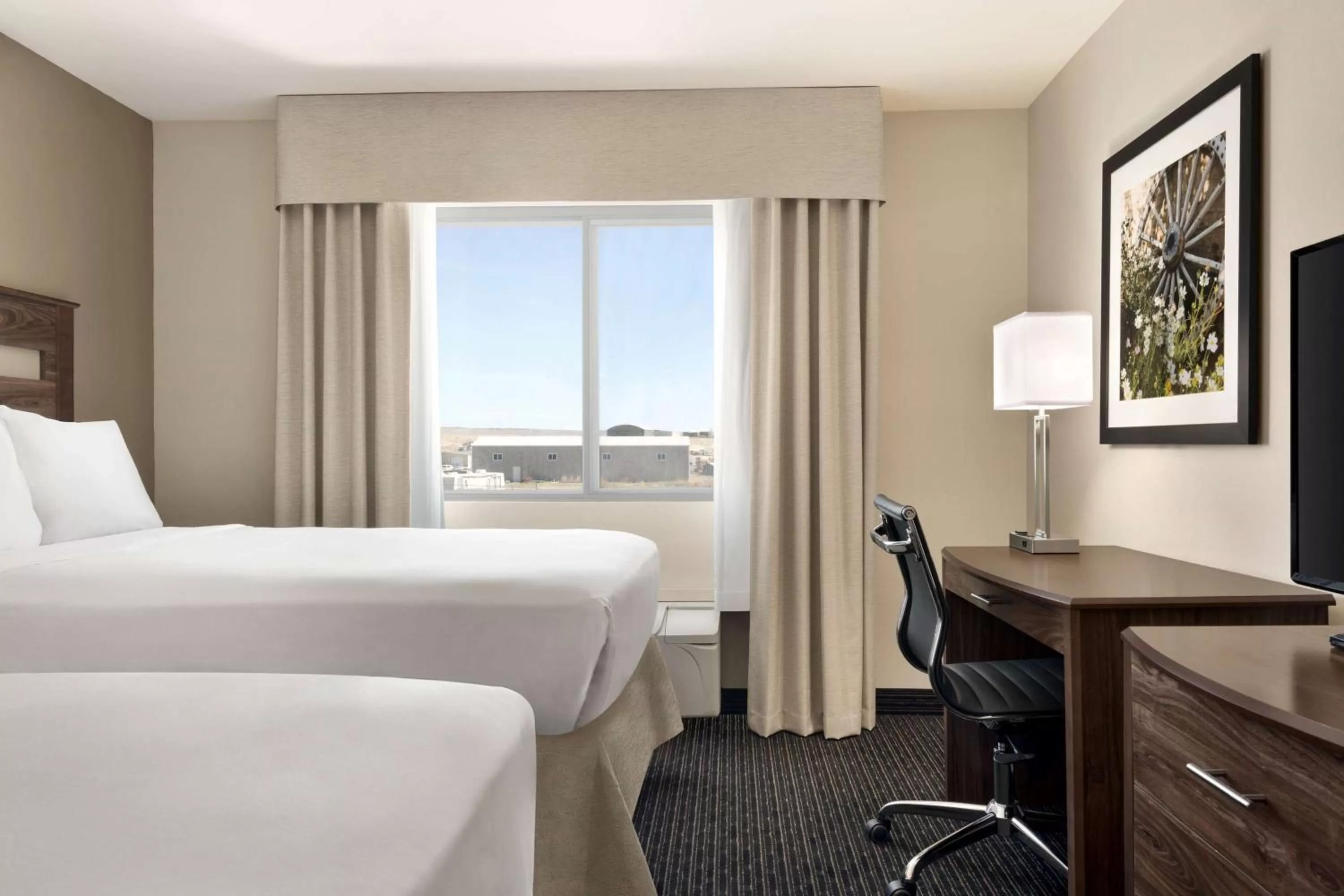 Photo of the whole room, Bed in Baymont by Wyndham Rawlins