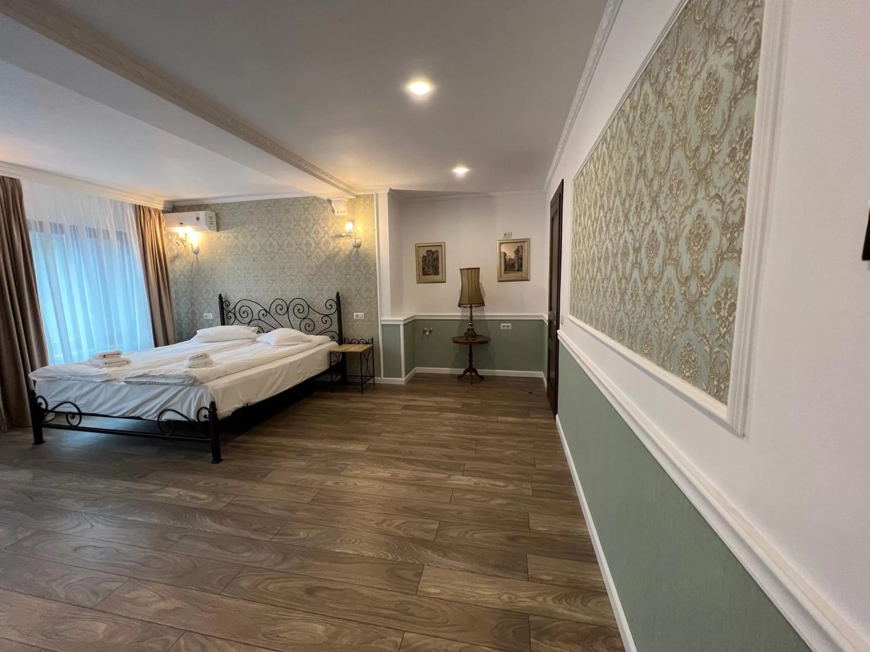 Bed in Hotel Boutique Cathedral Plaza Residences room for rent downtown