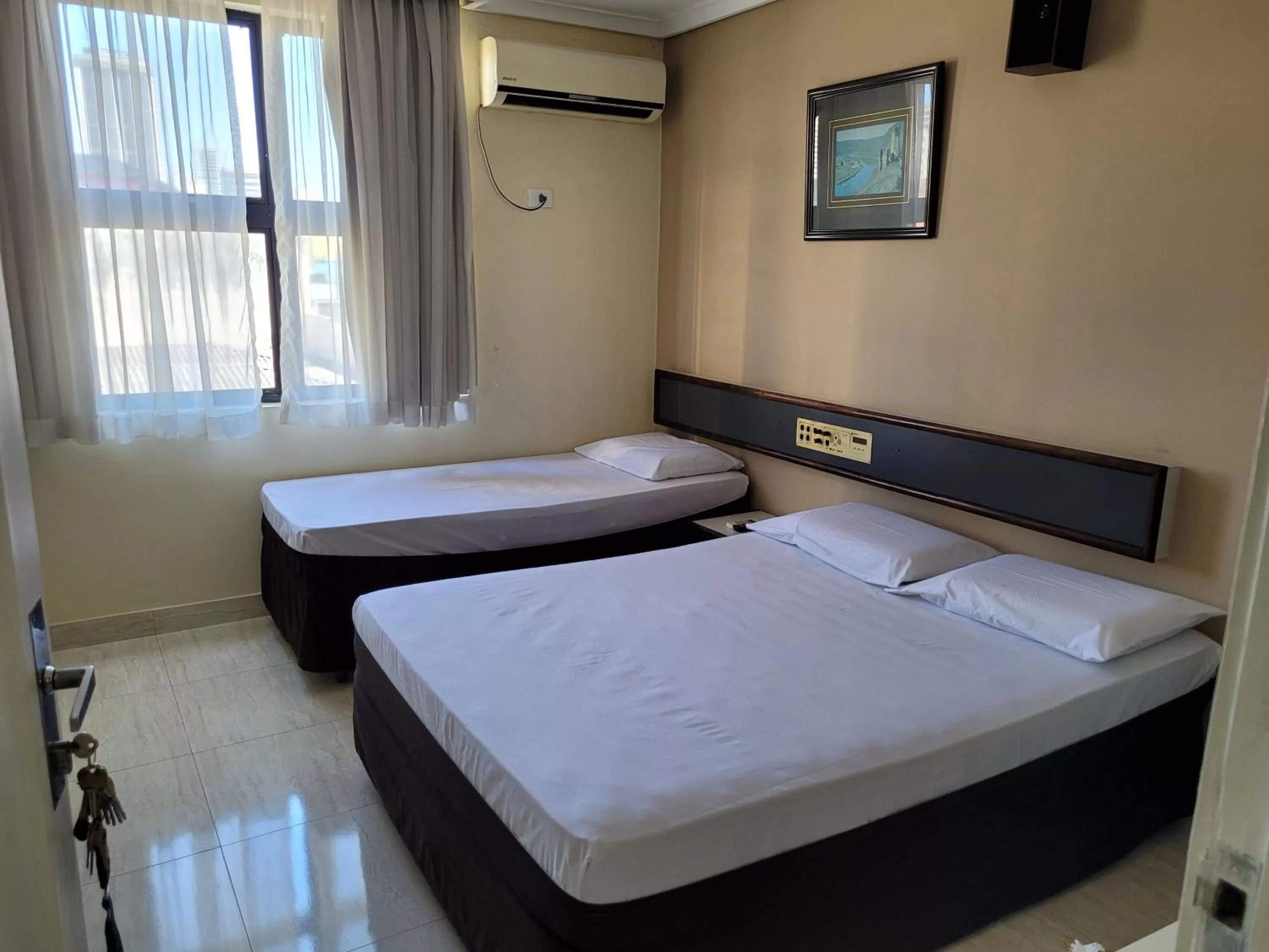 Bed in Hotel Estação Express