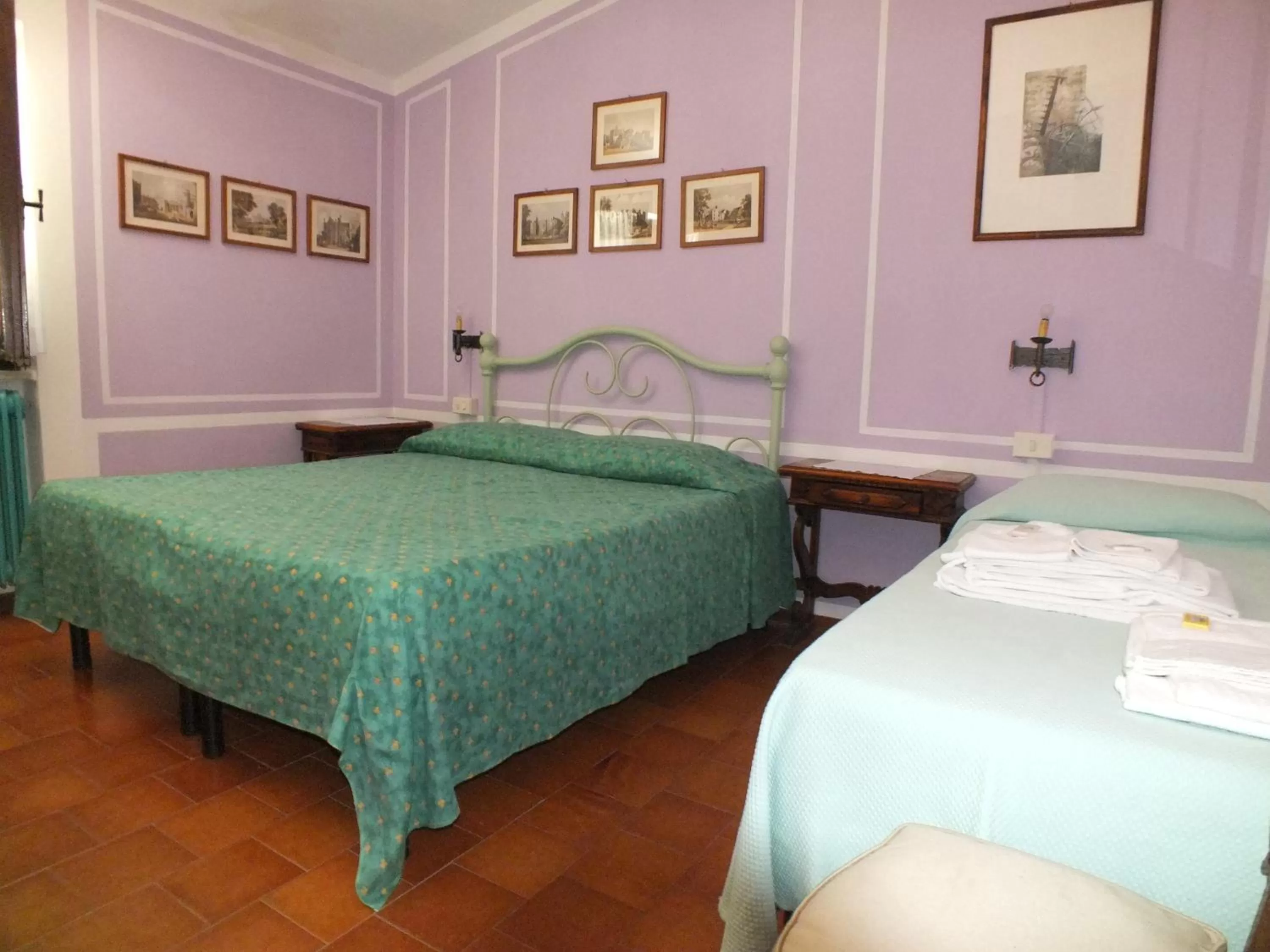 Photo of the whole room, Bed in Locanda Laudomia