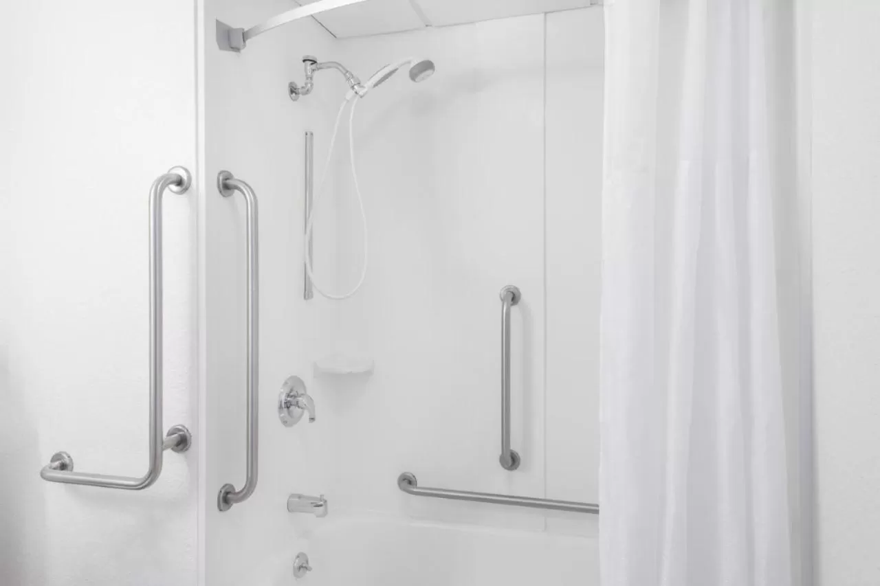 Shower in Super 8 by Wyndham Portland/Westbrook Area