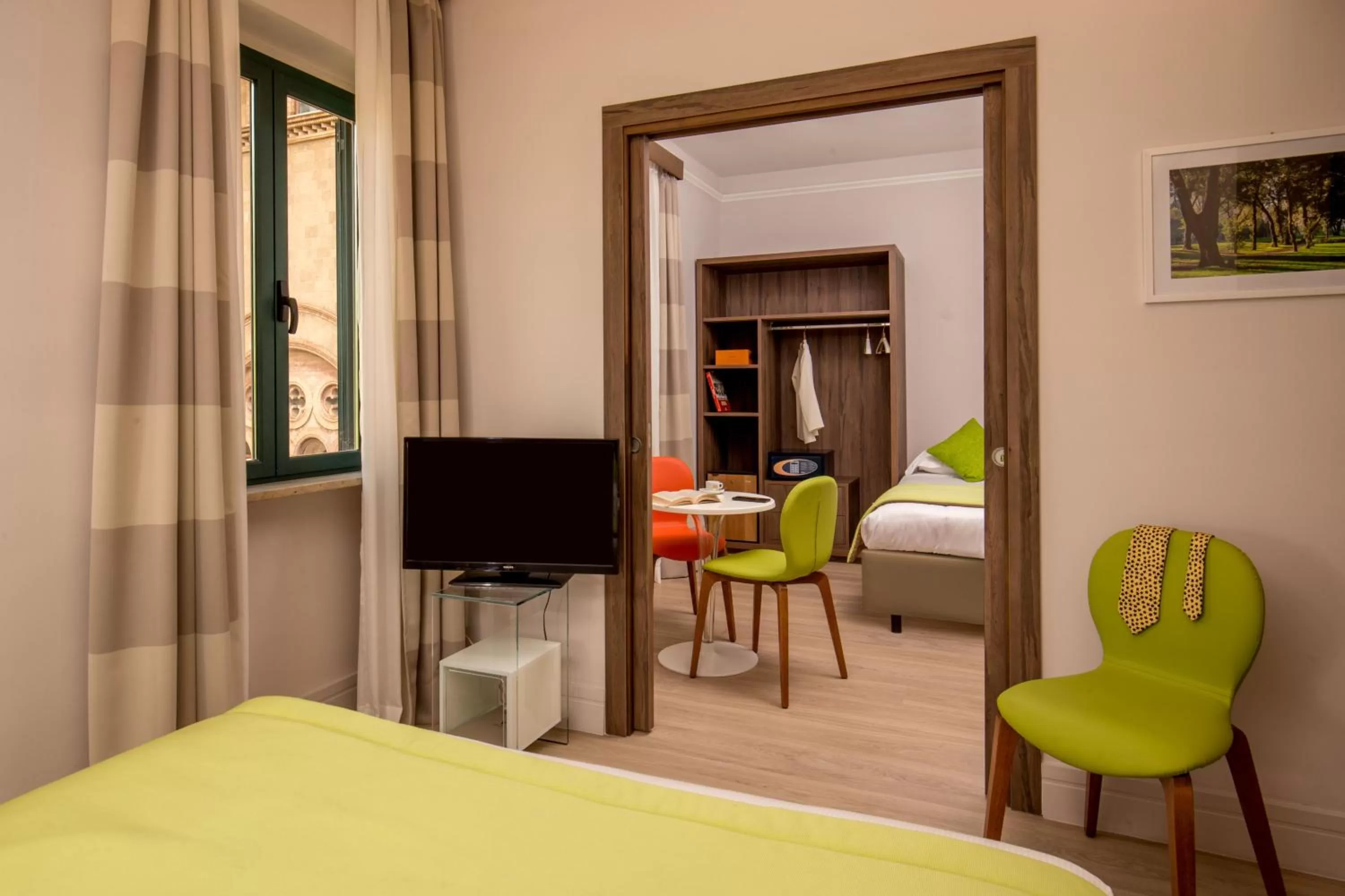 TV and multimedia, TV/Entertainment Center in Hotel Villa Grazioli