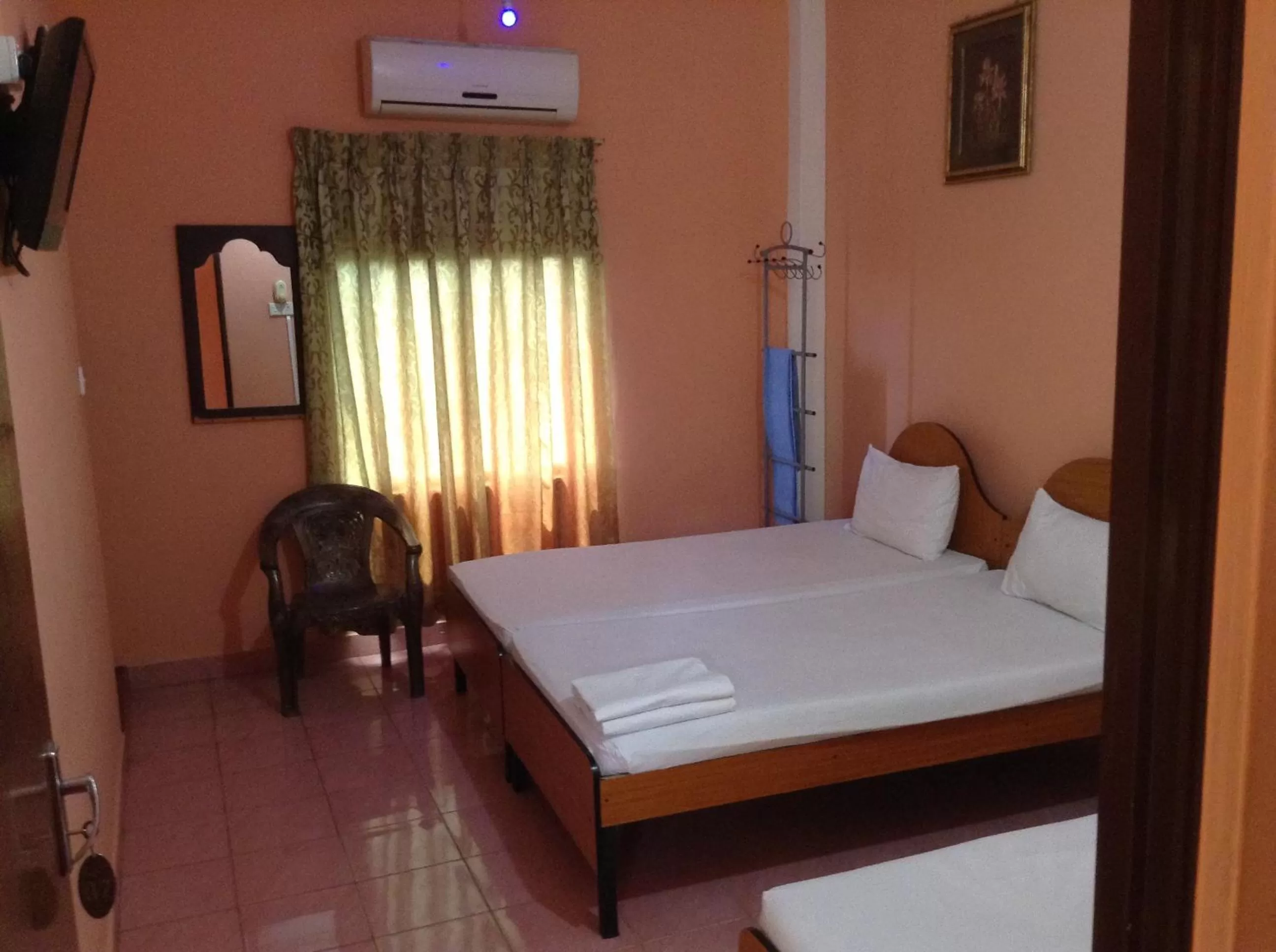 Bed in Sunshine Hotel