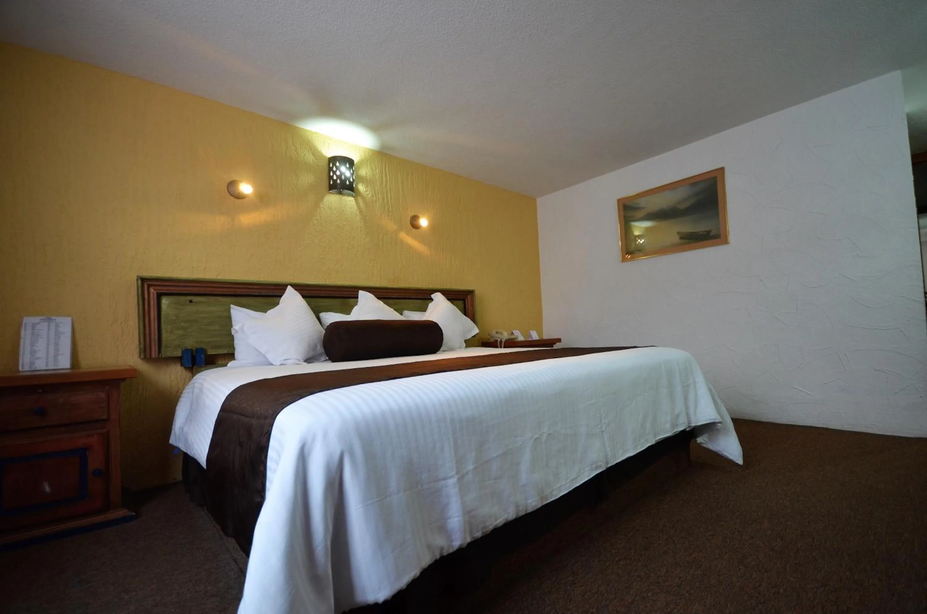 Bed in Howard Johnson by Wyndham Morelia Calle Real