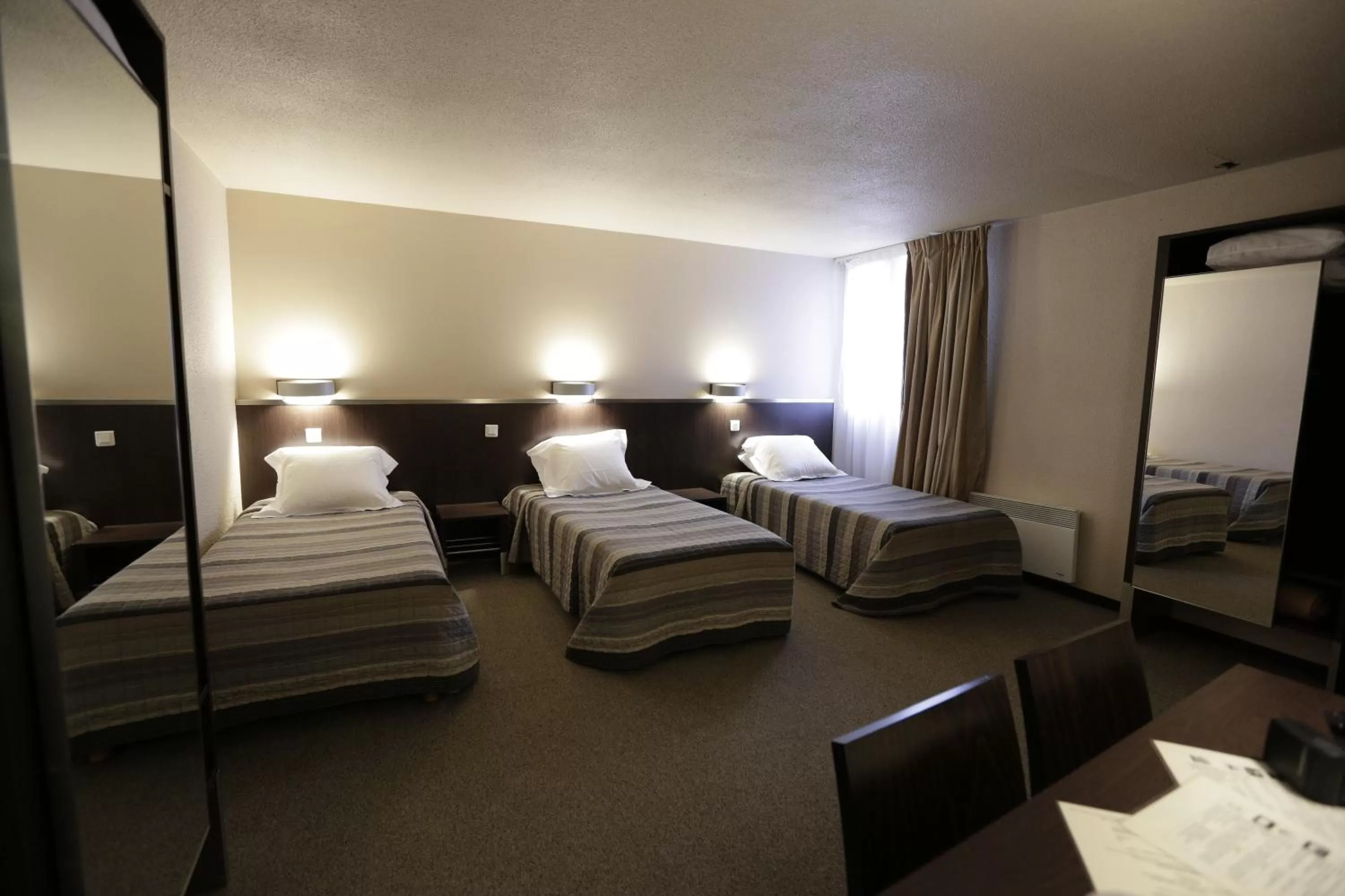 Bedroom, Bed in Hôtel Au Petit Caporal