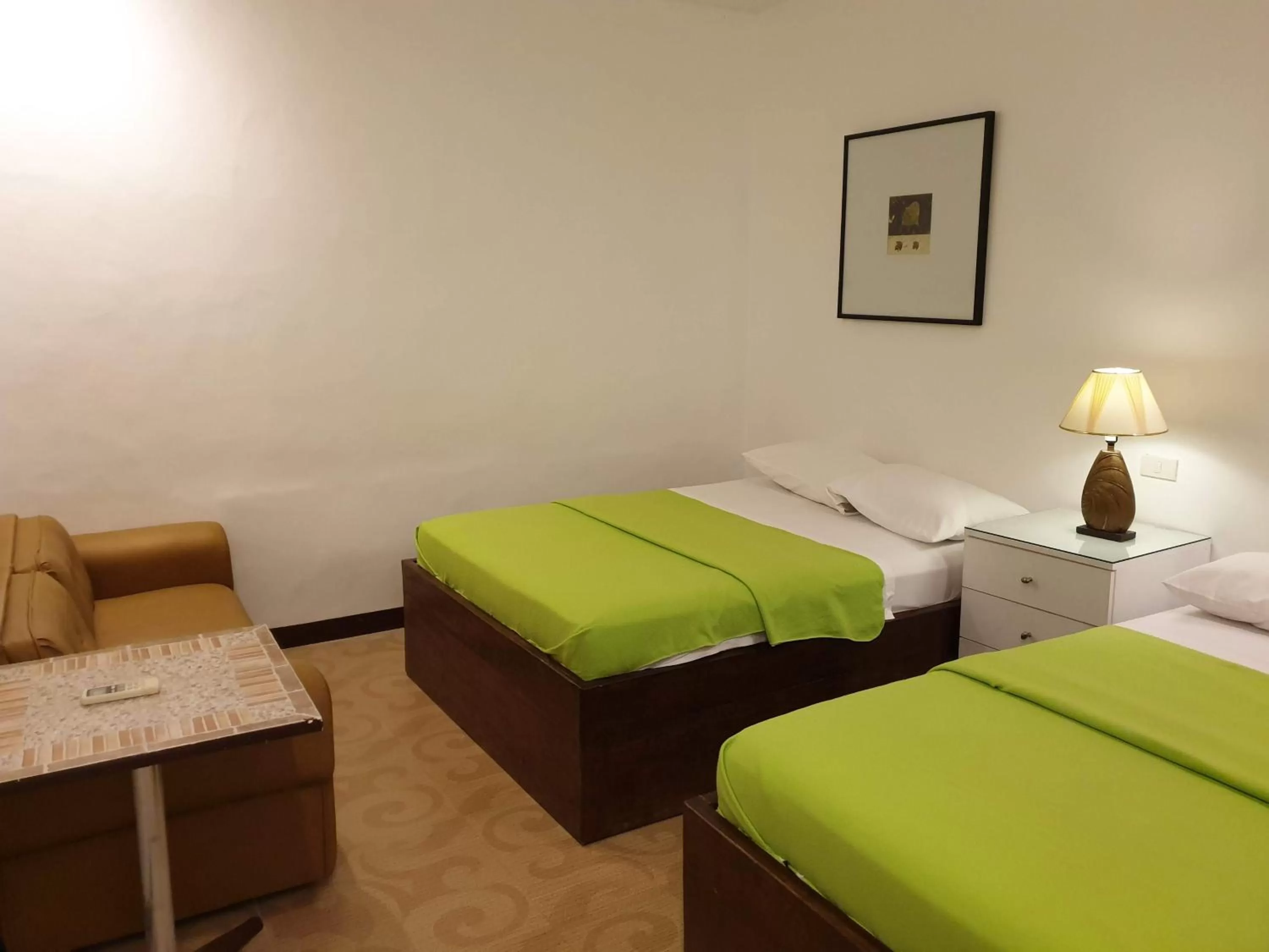 Bed in Raya Del Sol Dive Resort