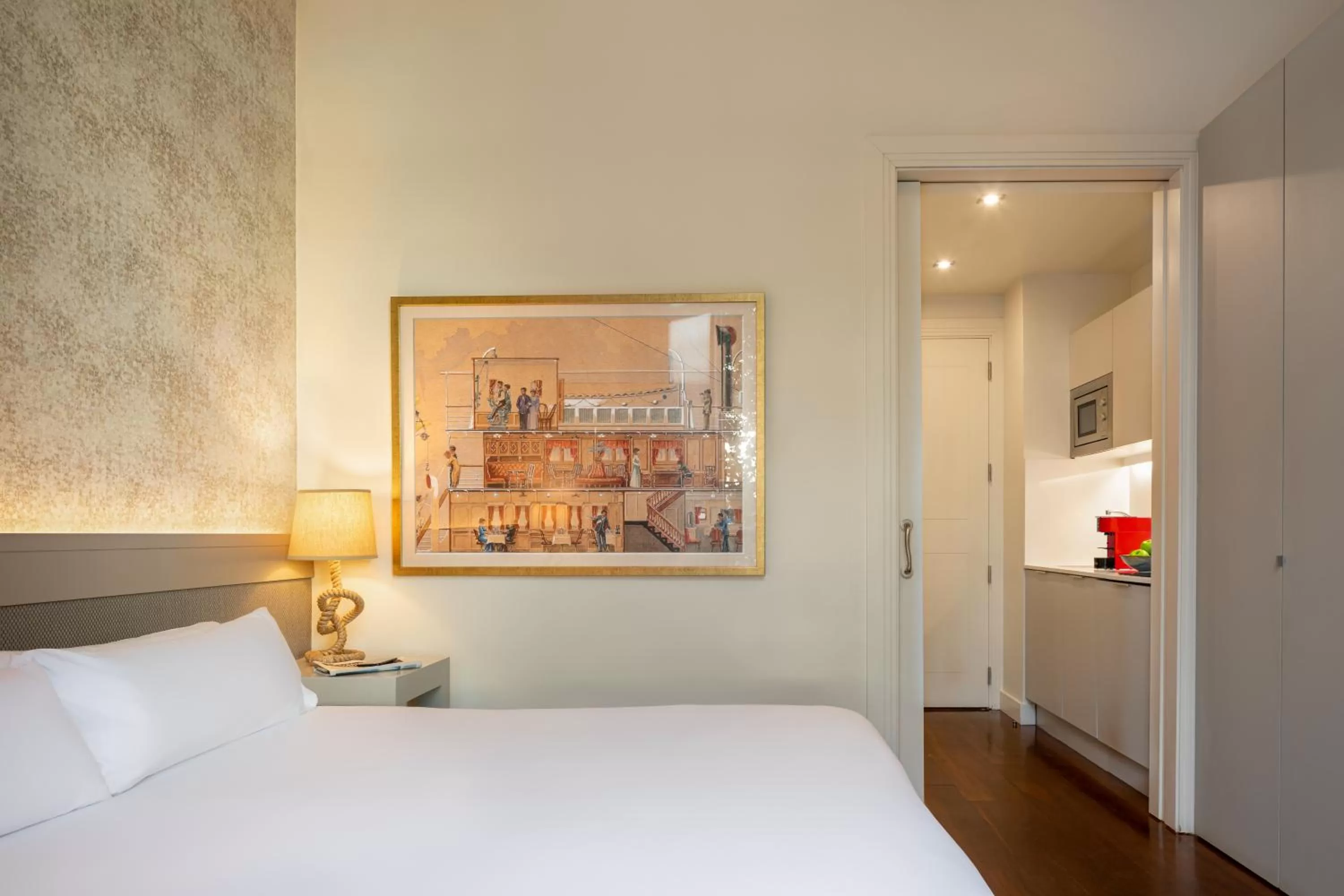 Photo of the whole room, Bed in Duquesa Suites Landmark Hotel by Grup Duquessa