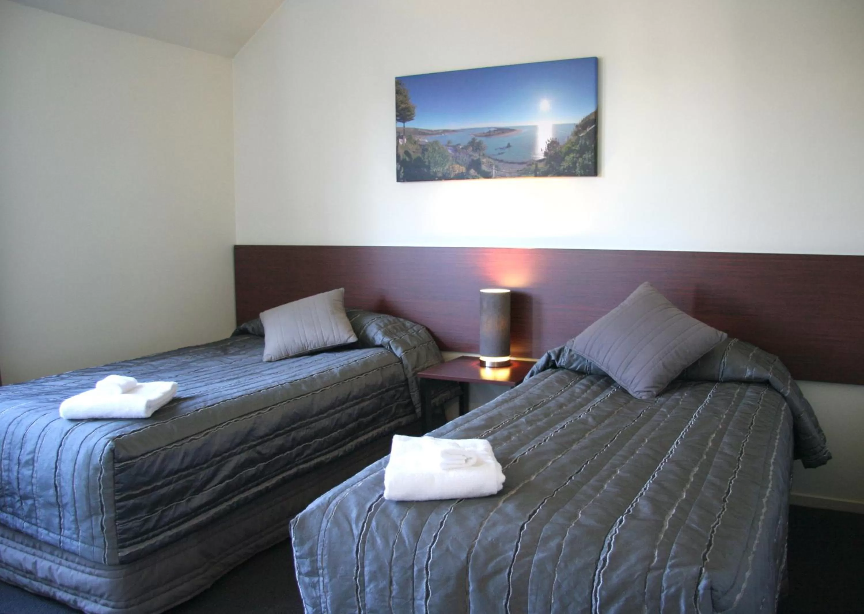 Bed in Sherborne Motor Lodge