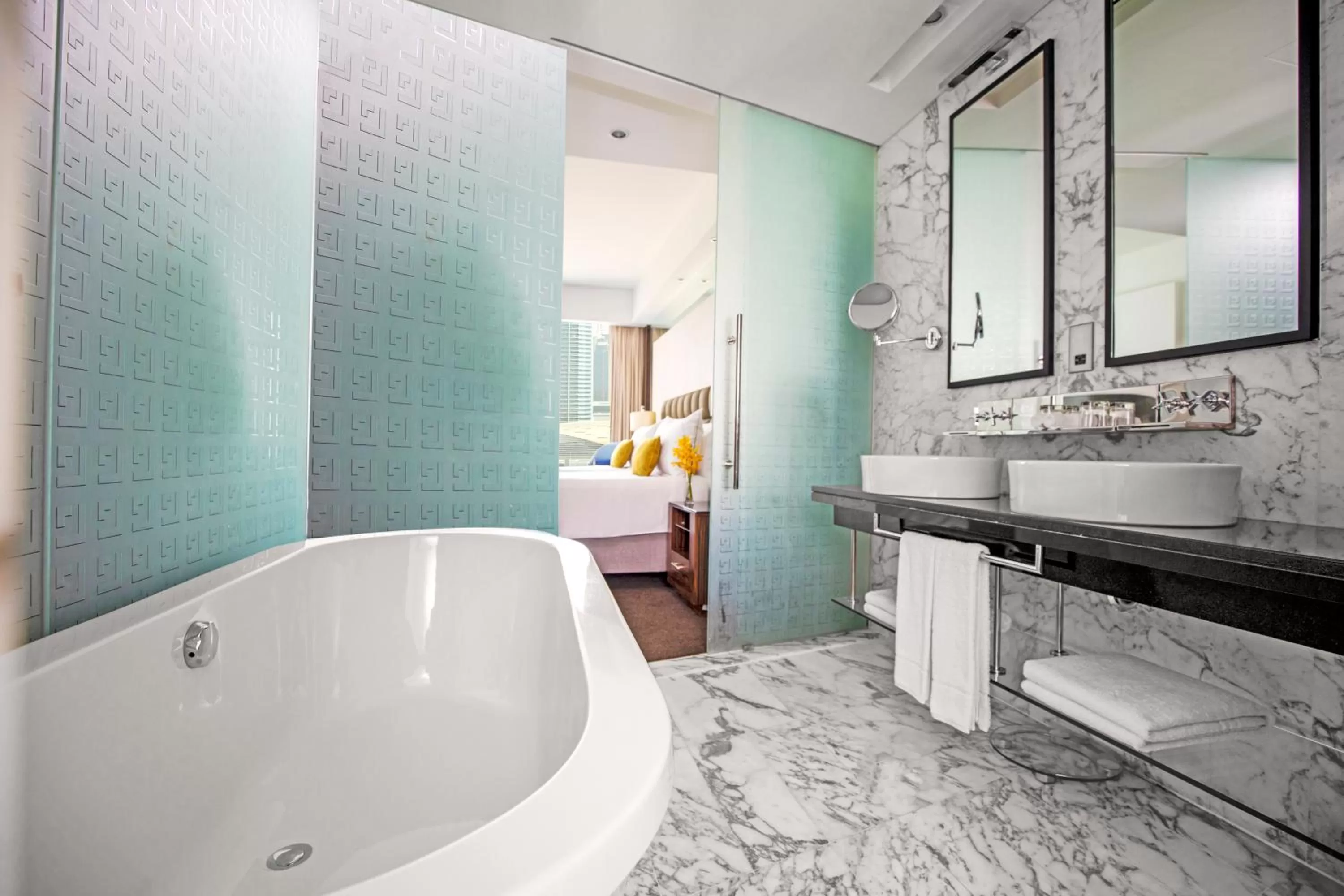 Bathroom, Bed in voco - Bonnington Dubai by IHG