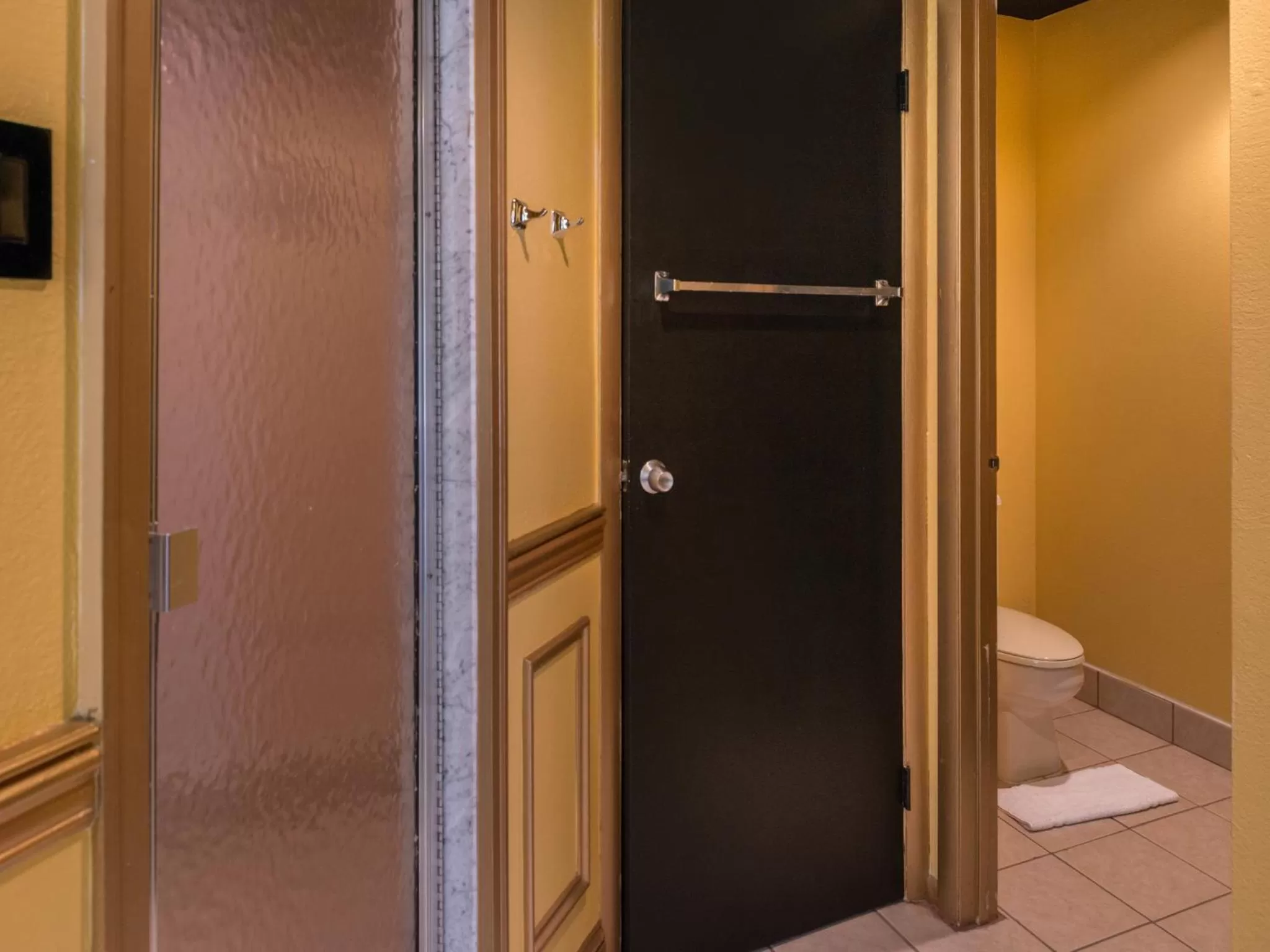 Toilet in Inn of The Dove Romantic Luxury & Business Suites