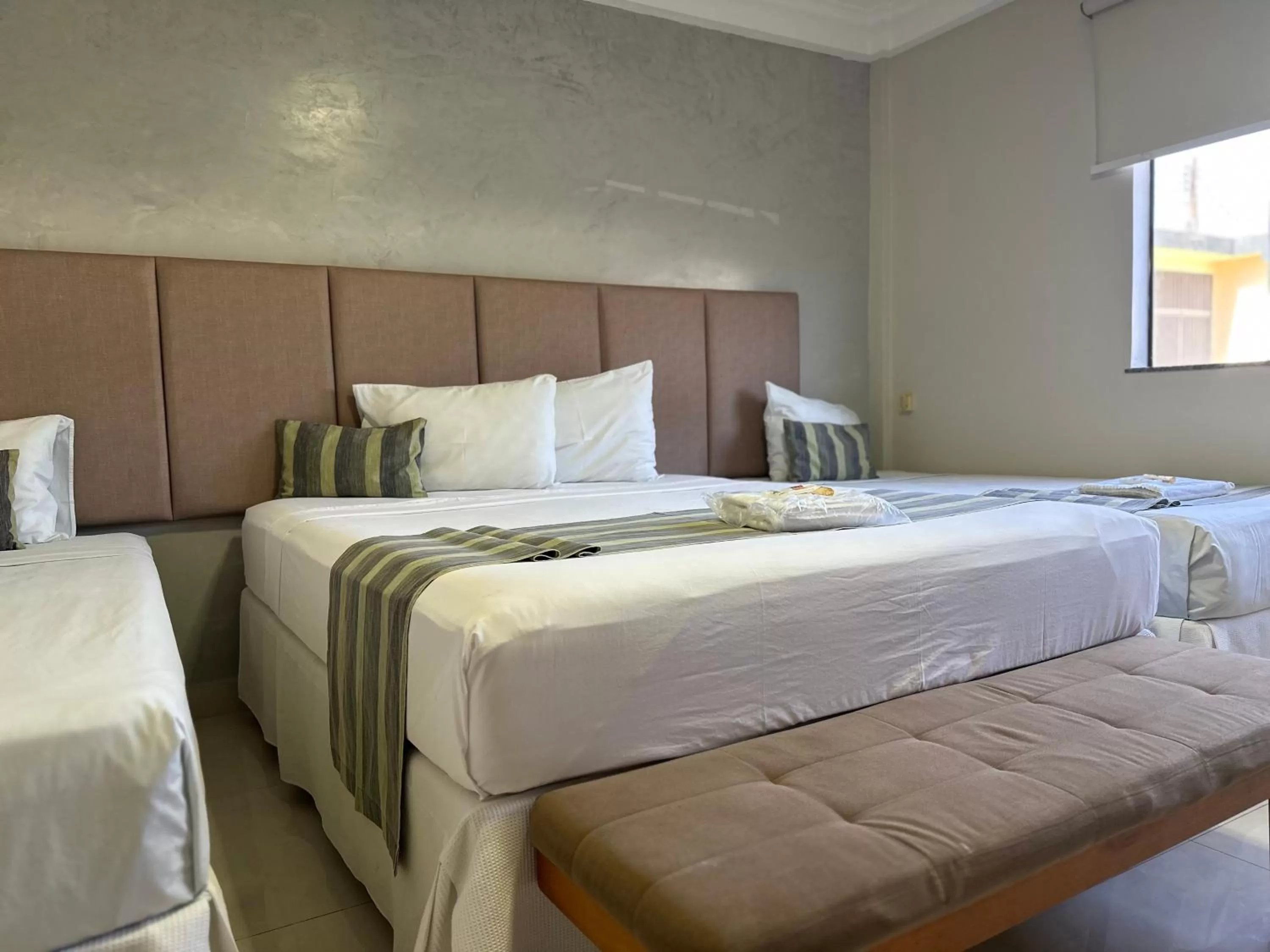 Bed in Atrium Confort Hotels