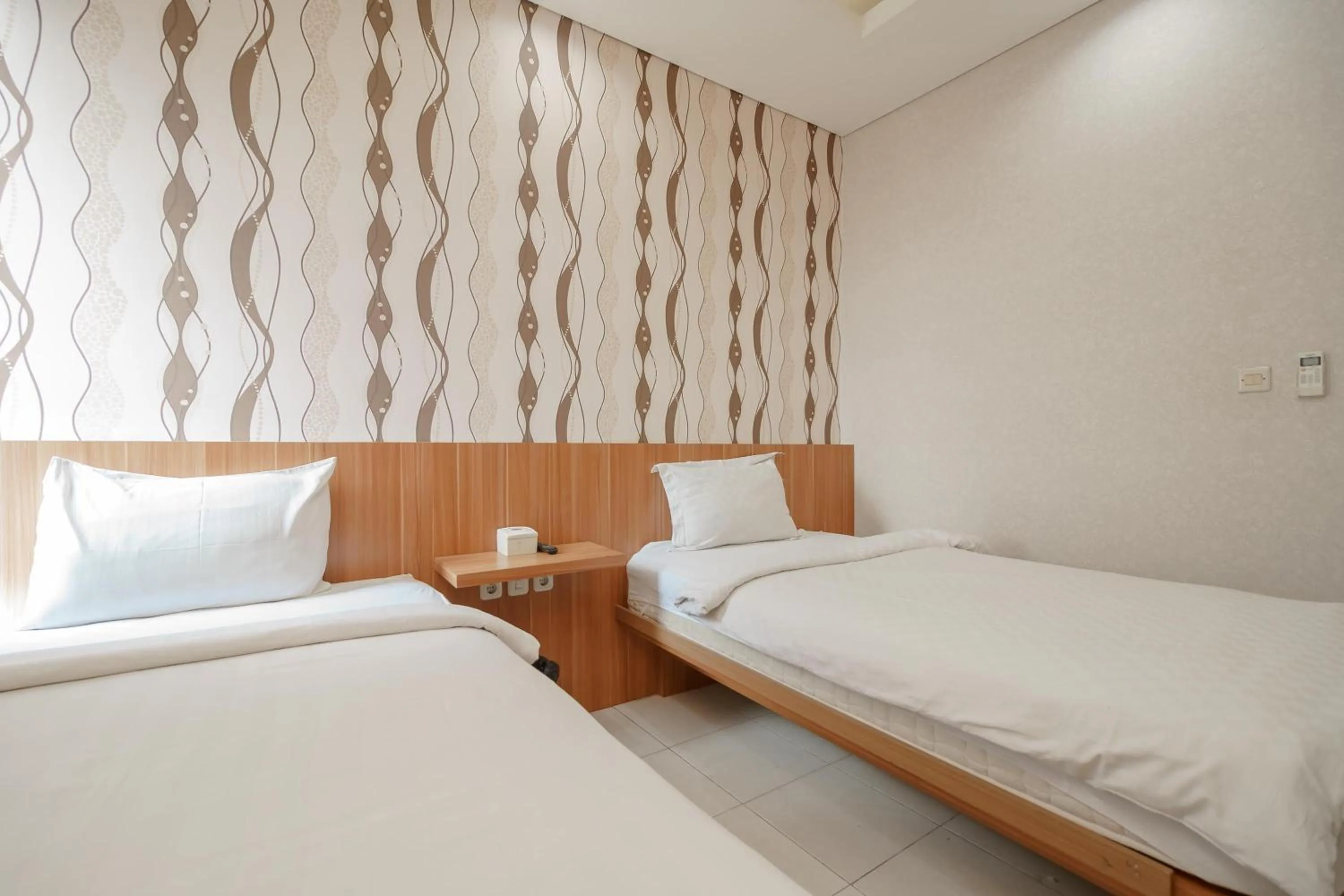 Bed in Green Apple Residence near Sarinah Mitra RedDoorz