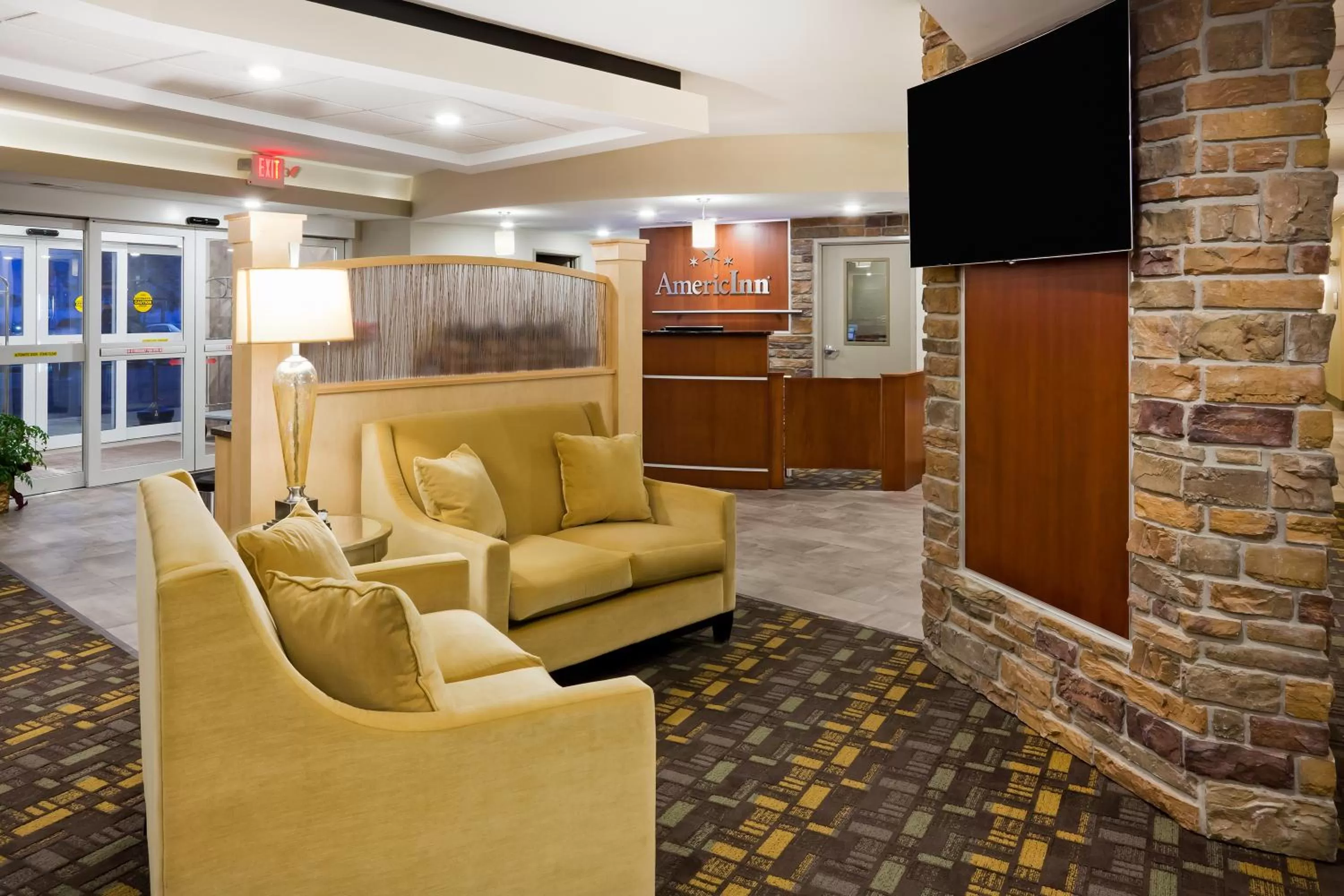Lobby or reception in AmericInn by Wyndham DeWitt