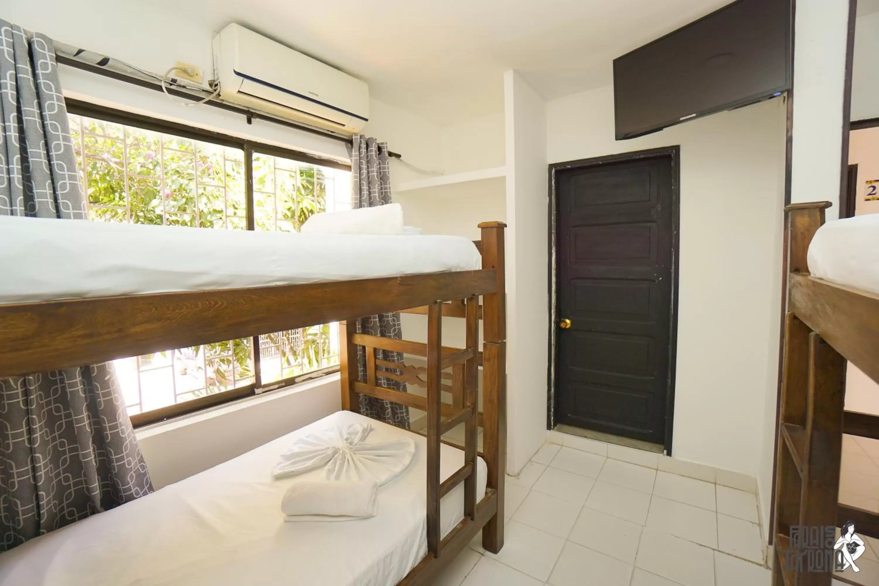 Quadruple Room with Private Bathroom in Hostal Paraiso Tayrona Quadruple Room with Private Bathroom in Hostal Paraiso Tayrona