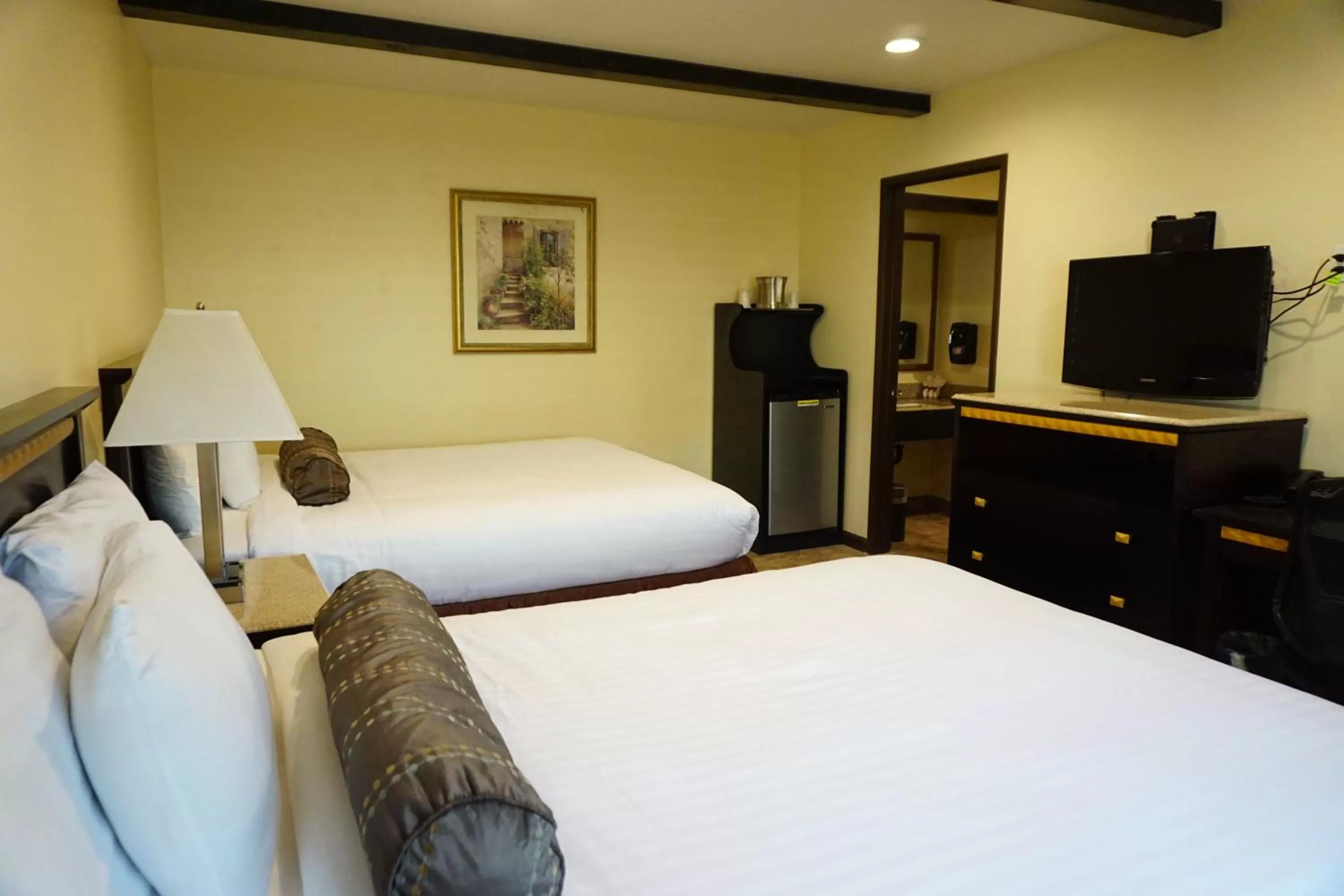 Photo of the whole room, Bed in Tuscan Garden Inn