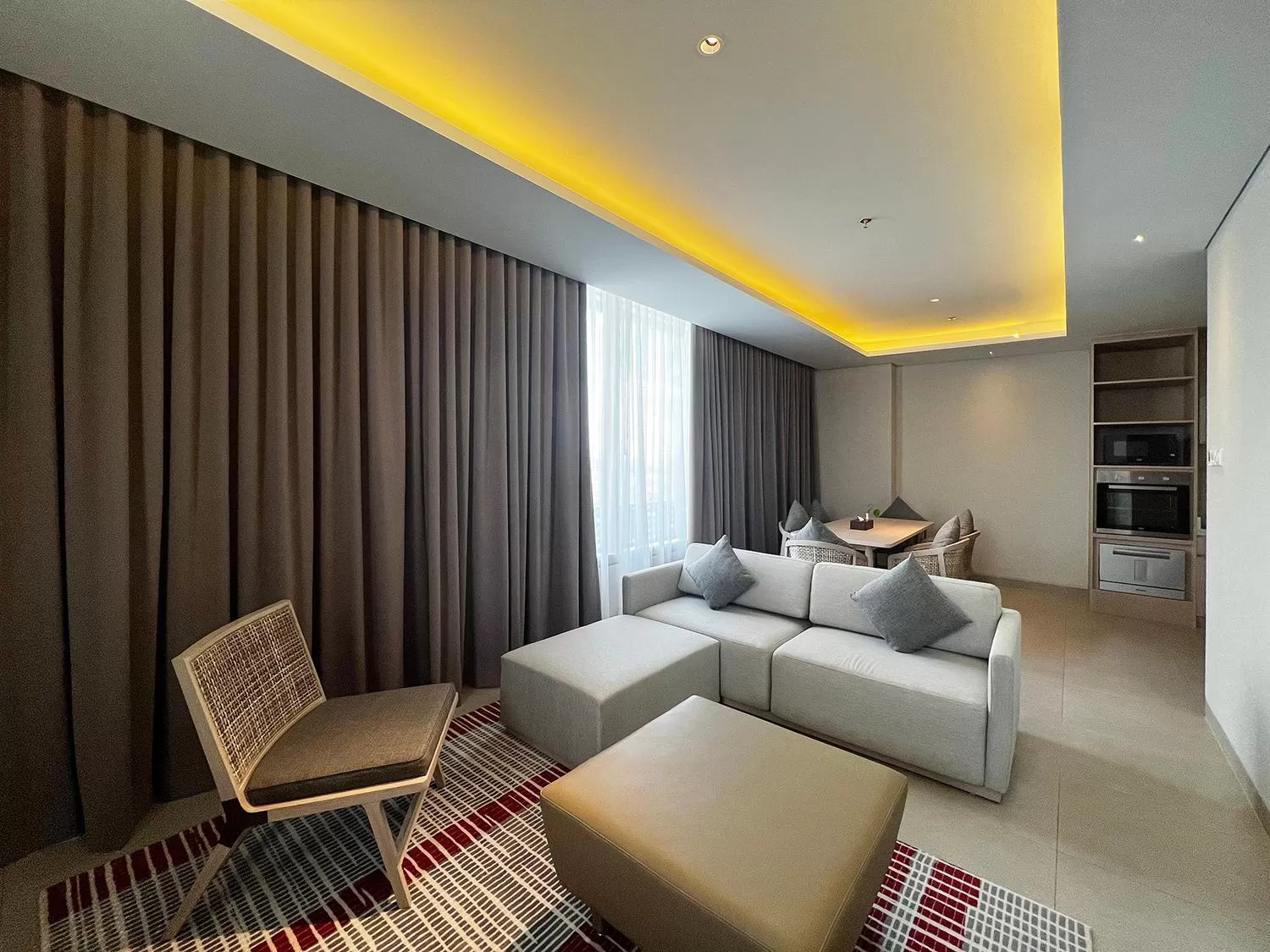 Living room, Bed in Ra Suites Simatupang