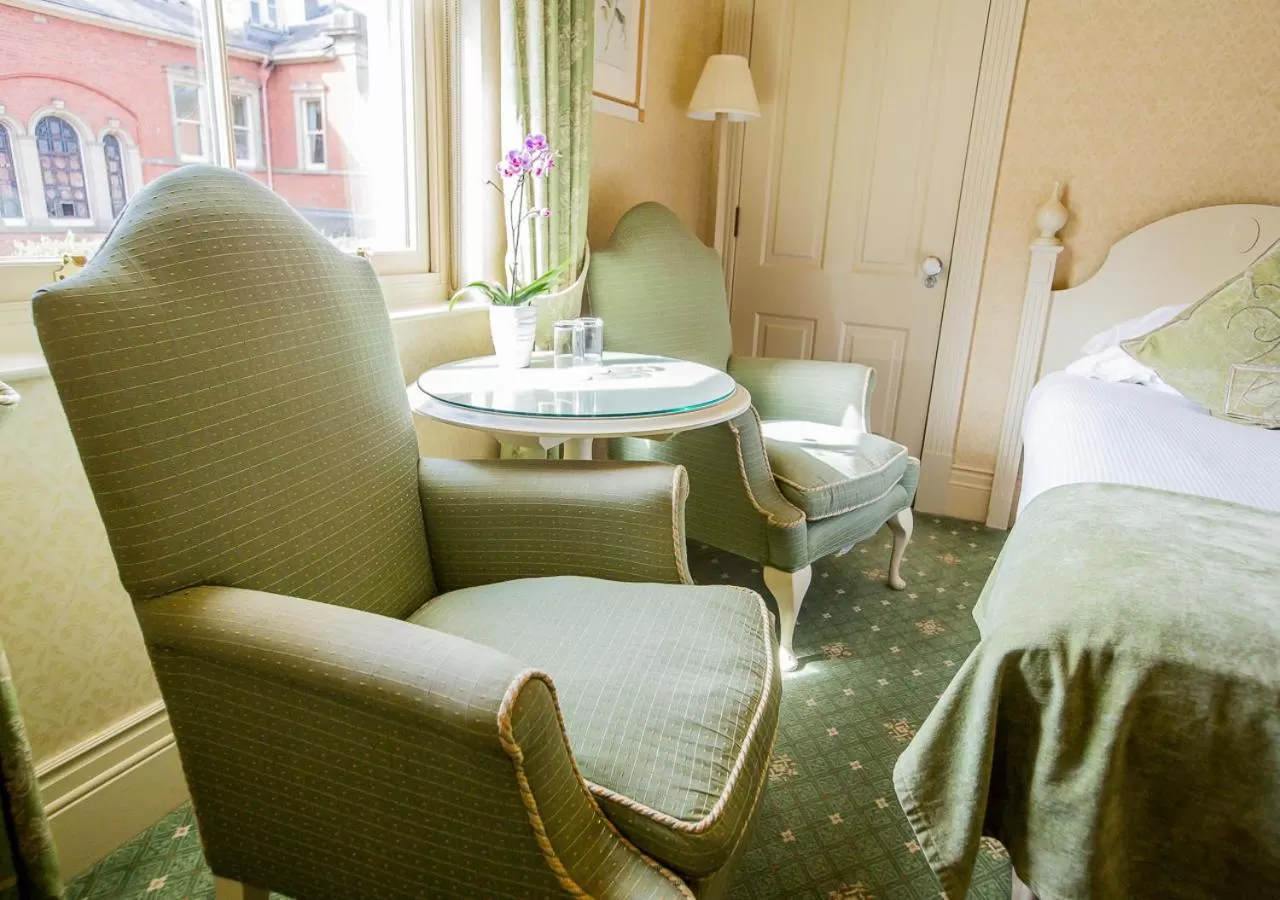 Seating area, Bed in Kilworth House Hotel and Theatre