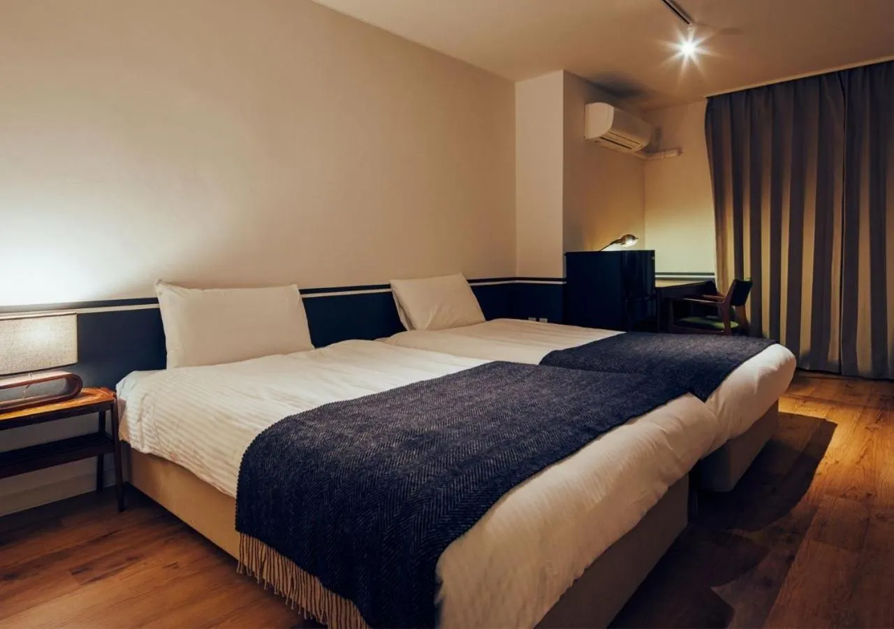 Bed in Hotel Graphy Nezu